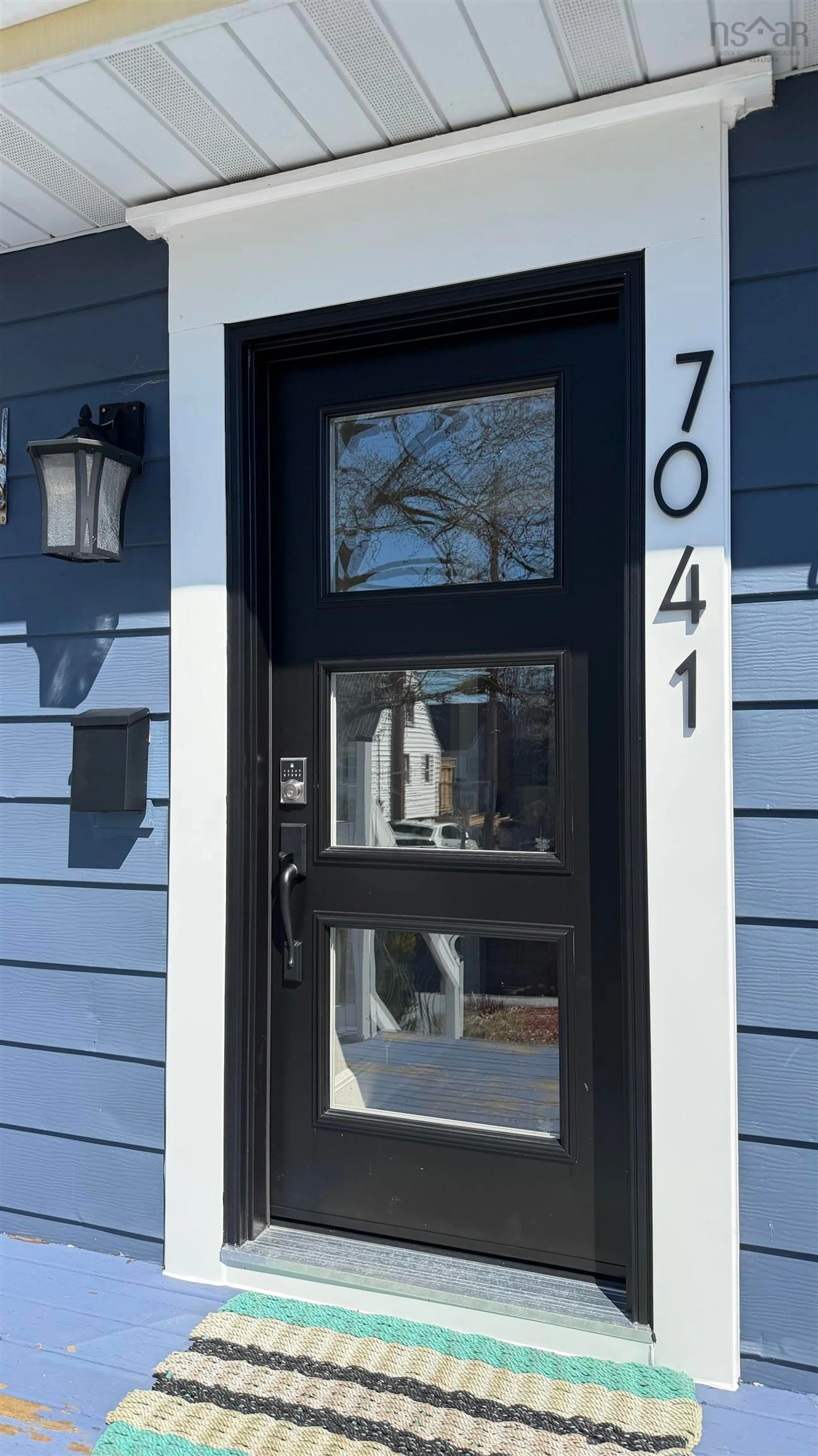Home with vinyl exterior material, street for 7041 Pearson Dr, Halifax Nova Scotia B3L 2K7