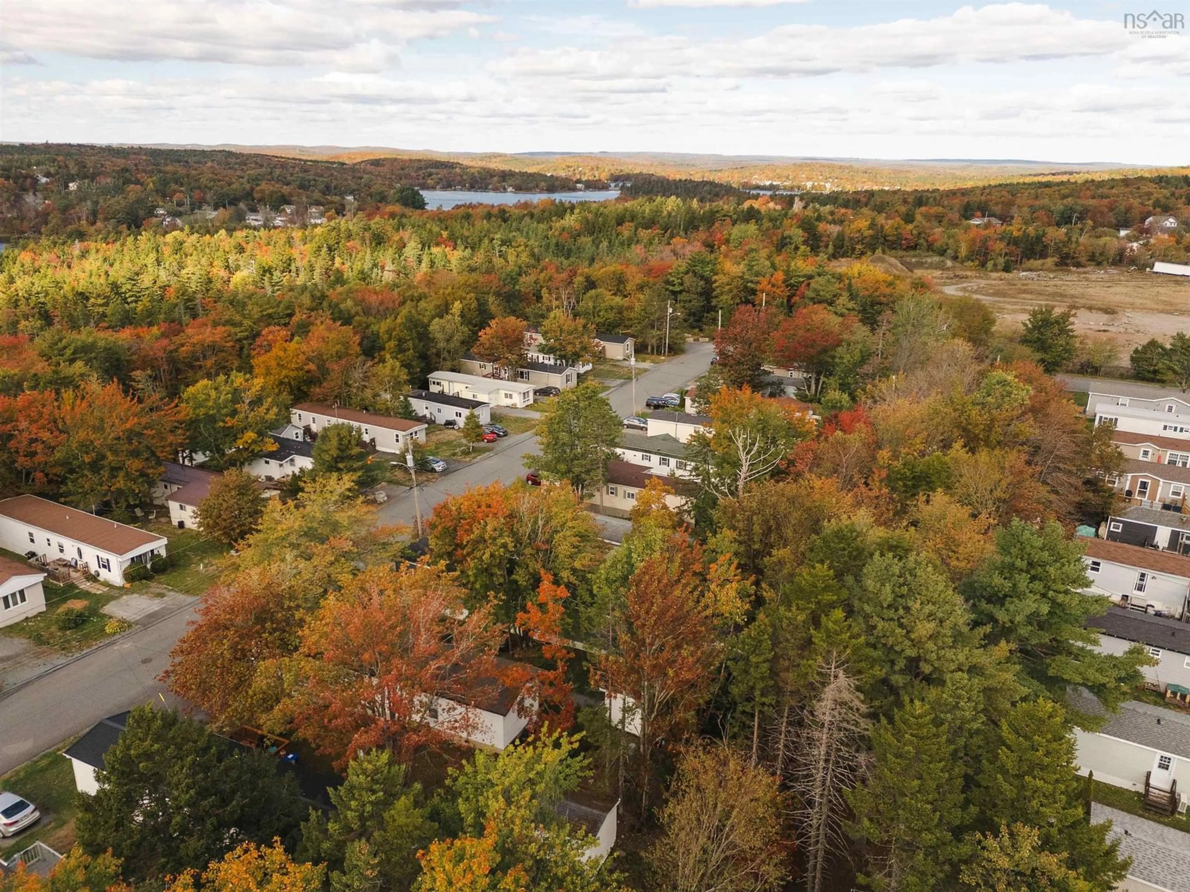 A pic from outside/outdoor area/front of a property/back of a property/a pic from drone, water/lake/river/ocean view for 18 Commodore Ave, Middle Sackville Nova Scotia B4E 3B2