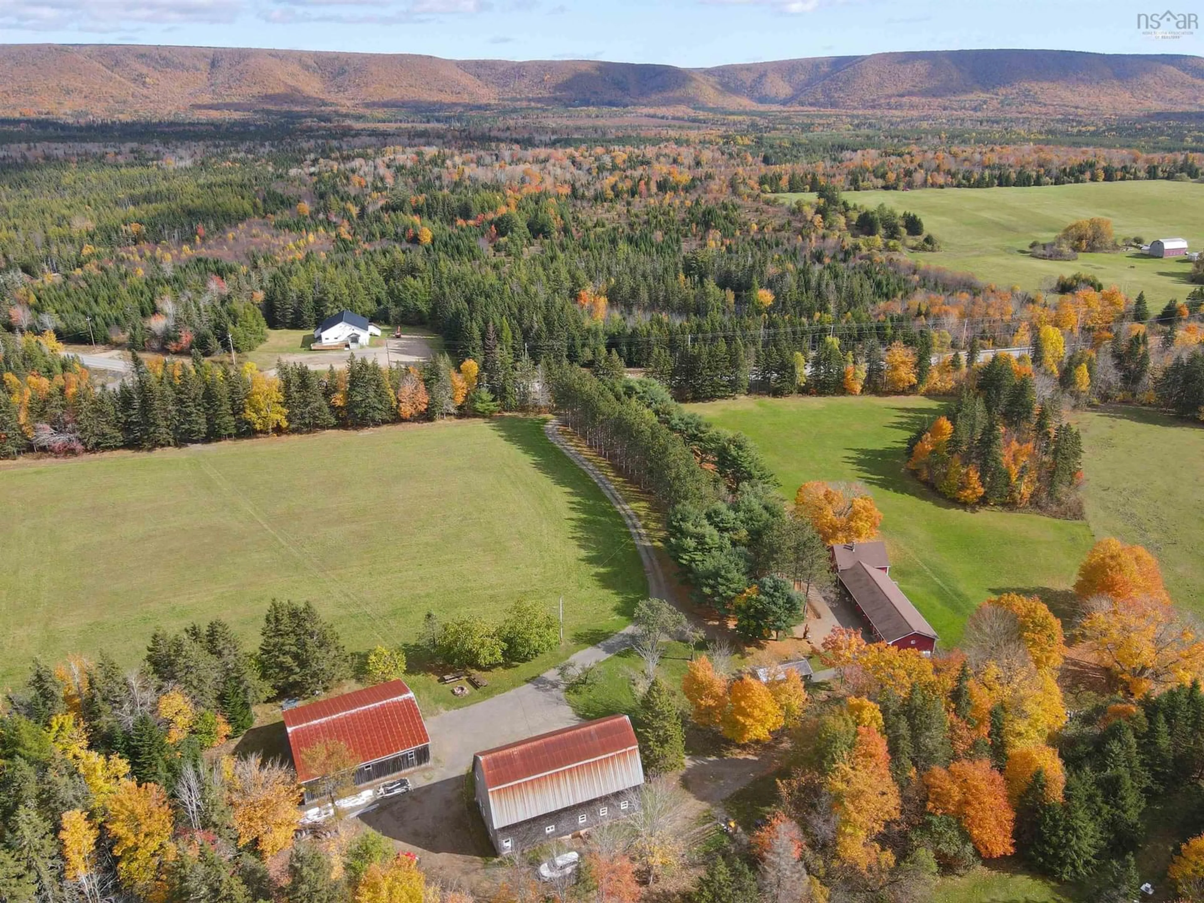 A pic from outside/outdoor area/front of a property/back of a property/a pic from drone, mountain view for 2639 Cabot Trail, Middle River Nova Scotia B0E 1B0