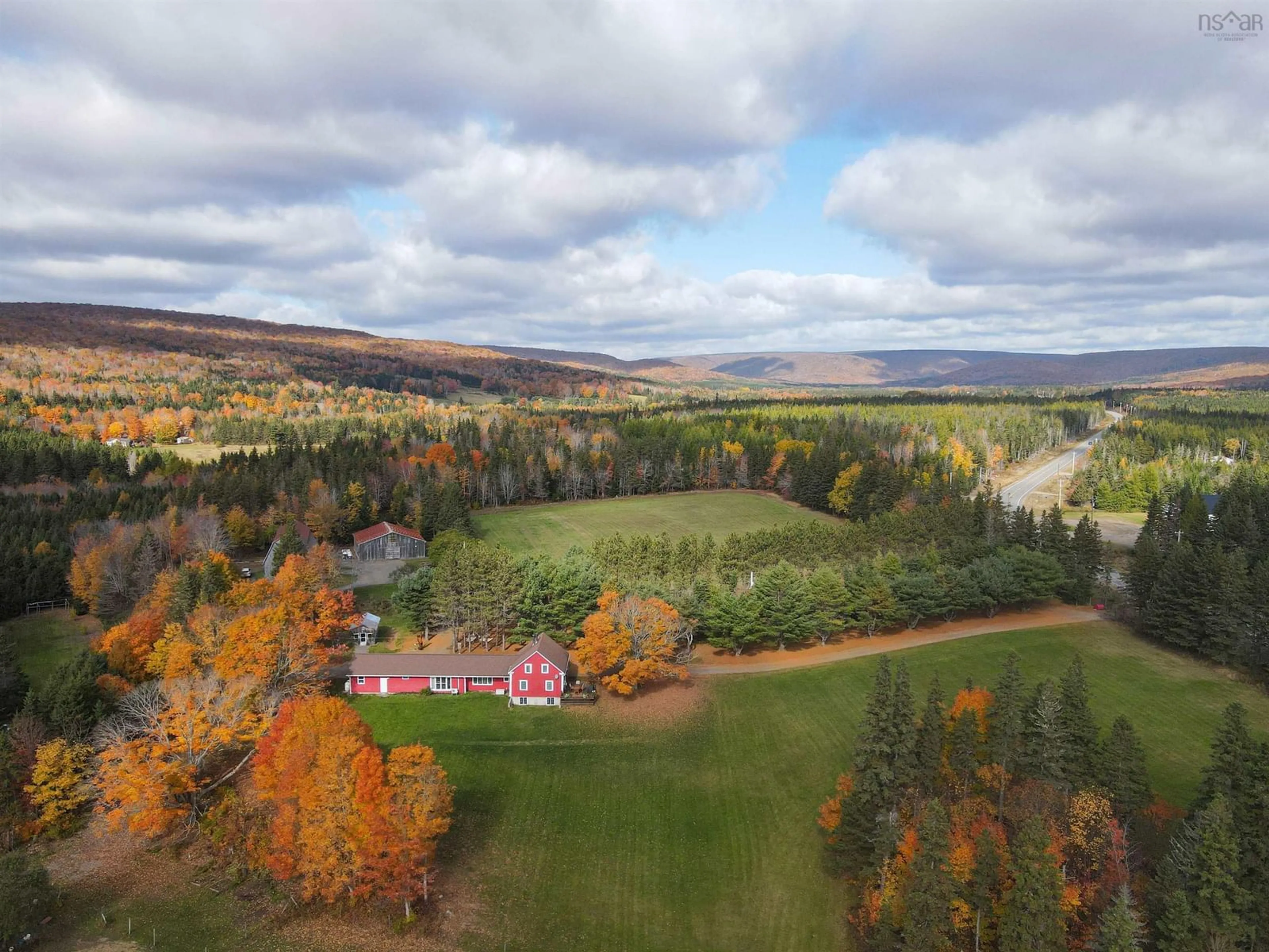 A pic from outside/outdoor area/front of a property/back of a property/a pic from drone, forest/trees view for 2639 Cabot Trail, Middle River Nova Scotia B0E 1B0