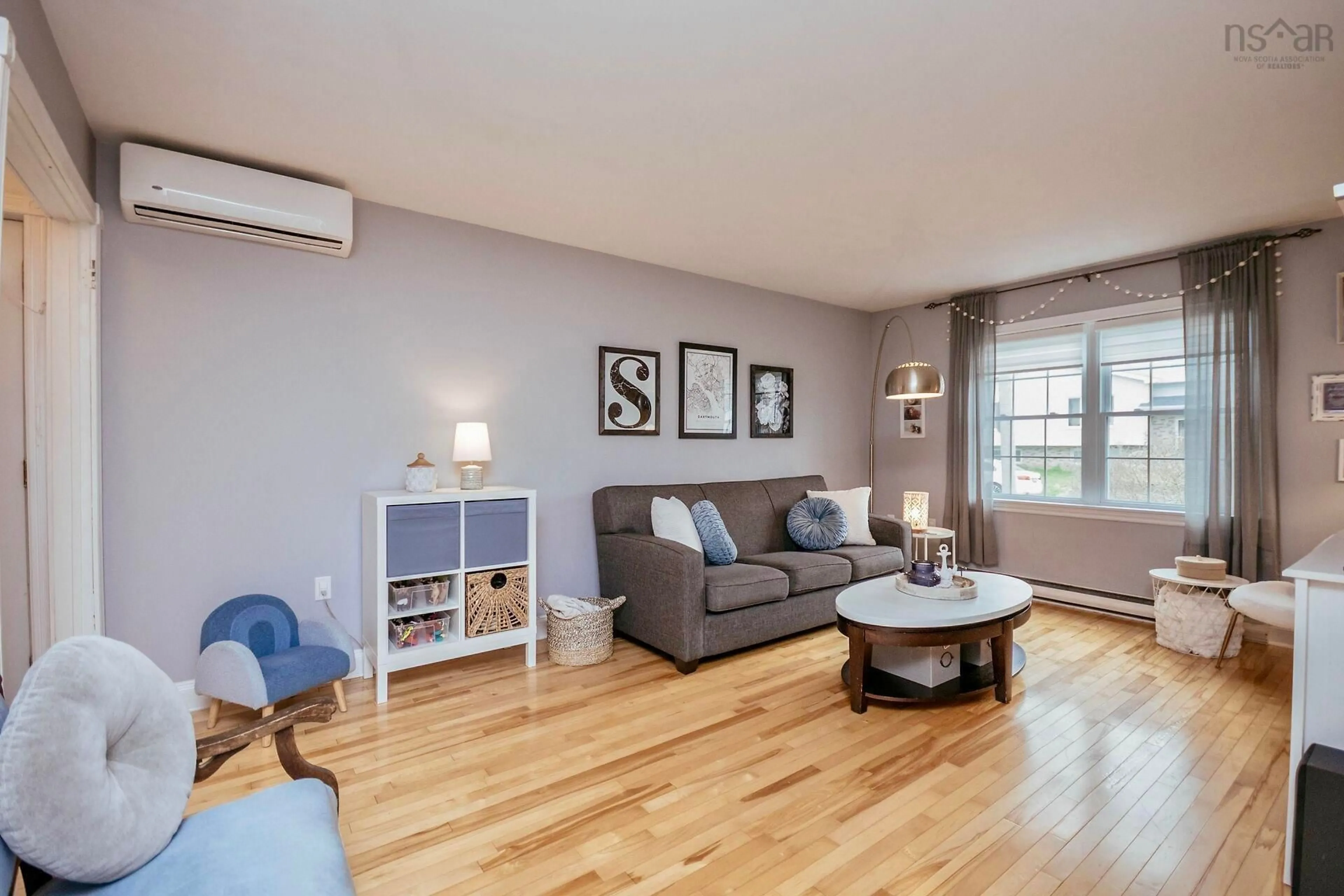 Living room with furniture, wood/laminate floor for 24 Oakwood Crt, Dartmouth Nova Scotia B2W 5P8