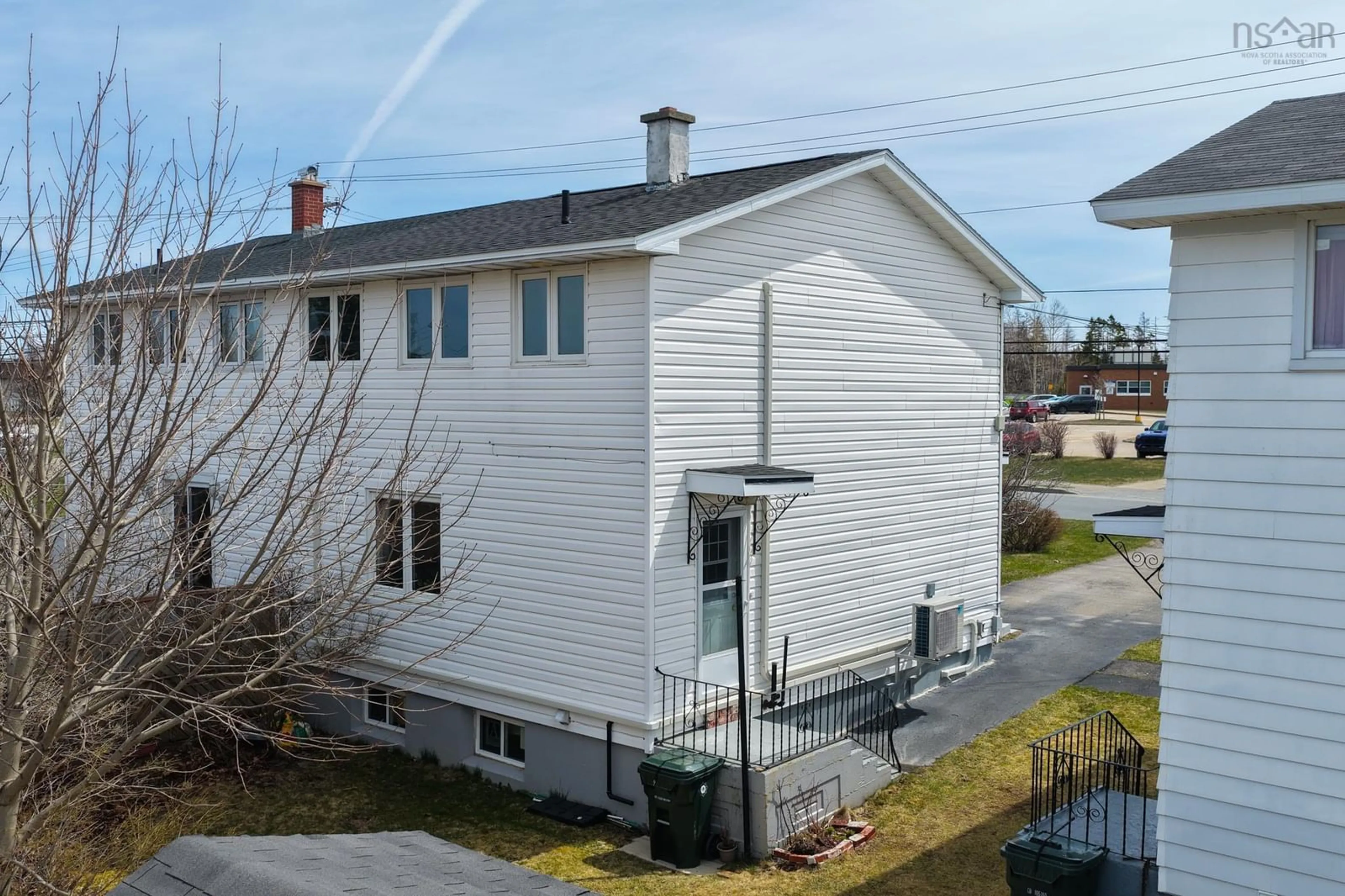 A pic from outside/outdoor area/front of a property/back of a property/a pic from drone, unknown for 1023 Upper Prince St, Sydney Nova Scotia B1P 5P3