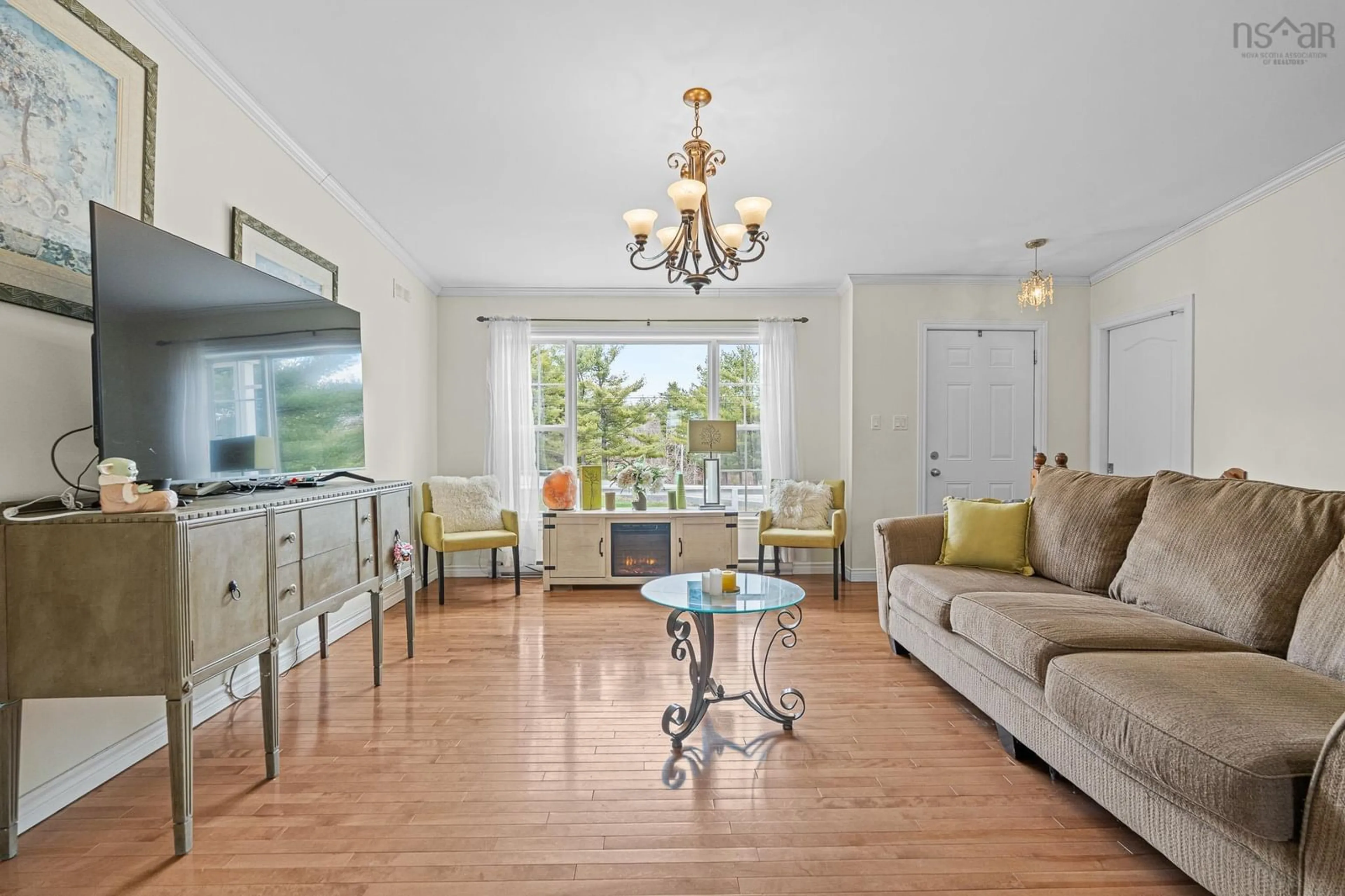 Living room with furniture, wood/laminate floor for 574 Dawson Rd, Ellershouse Nova Scotia B0N 1L0
