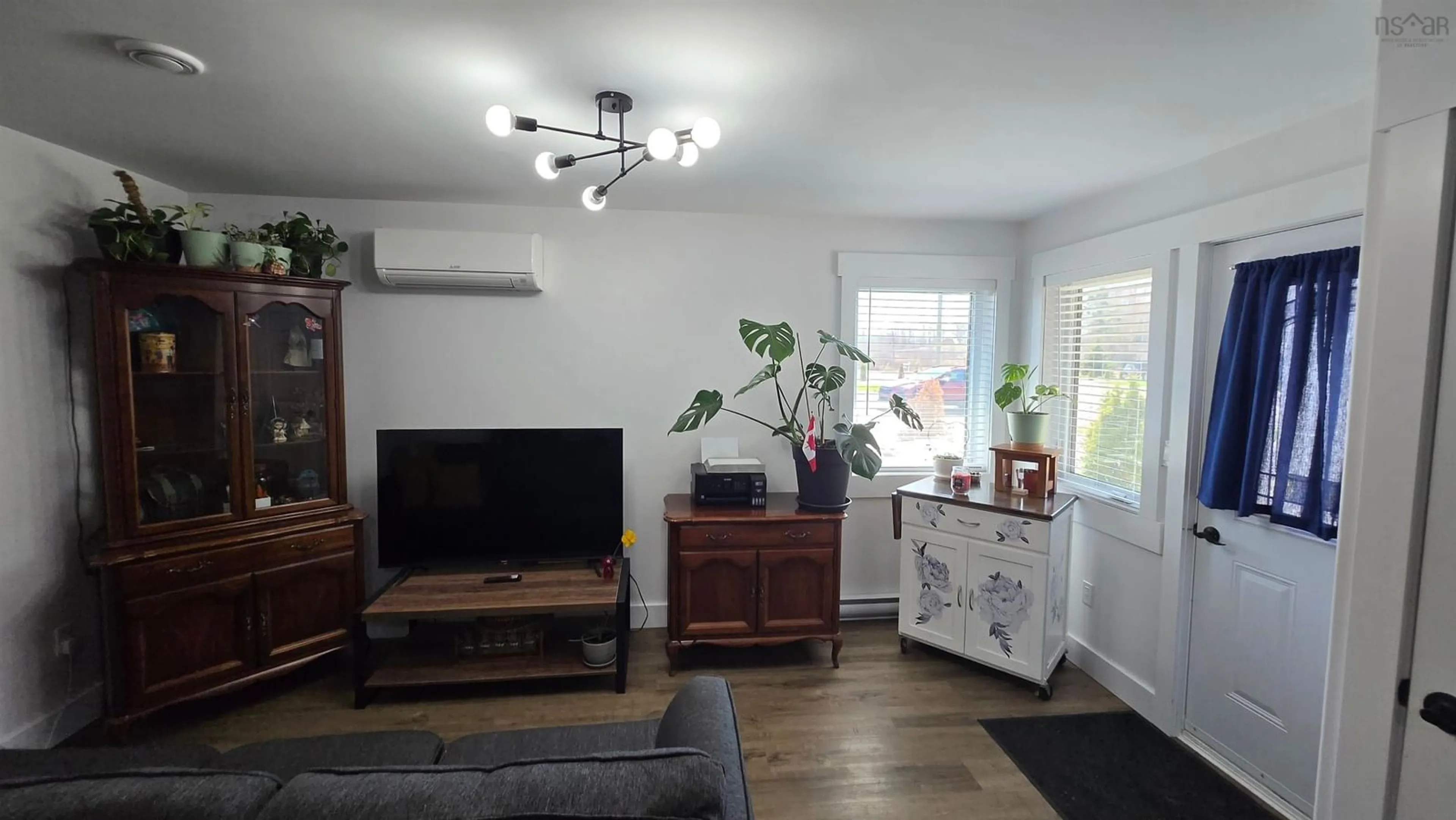 Living room with furniture, wood/laminate floor for 333 Nichols Ave, North Kentville Nova Scotia B4N 3V7