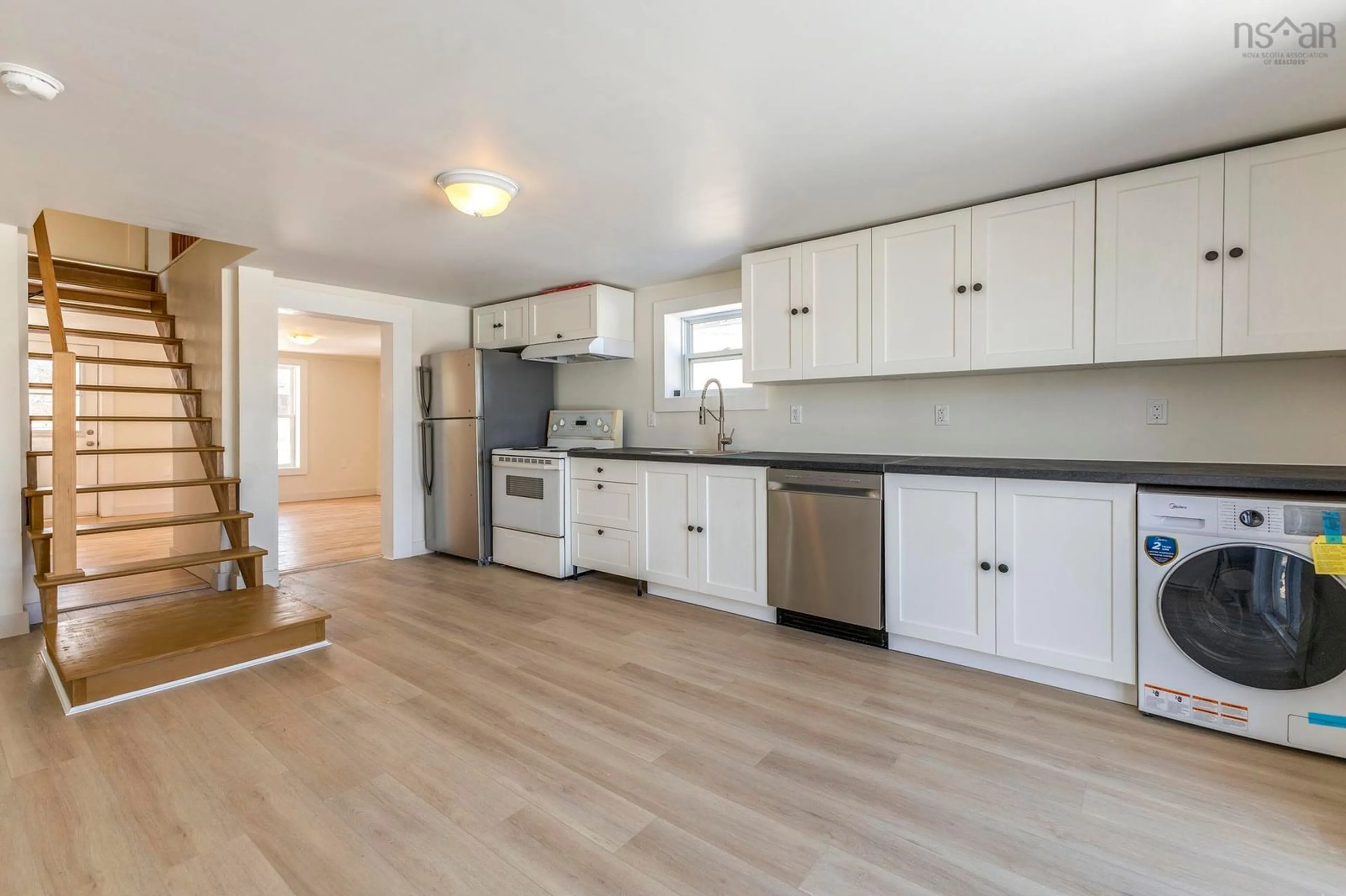 Open concept kitchen, wood/laminate floor for 2172 North St, Westville Nova Scotia B0K 2A0
