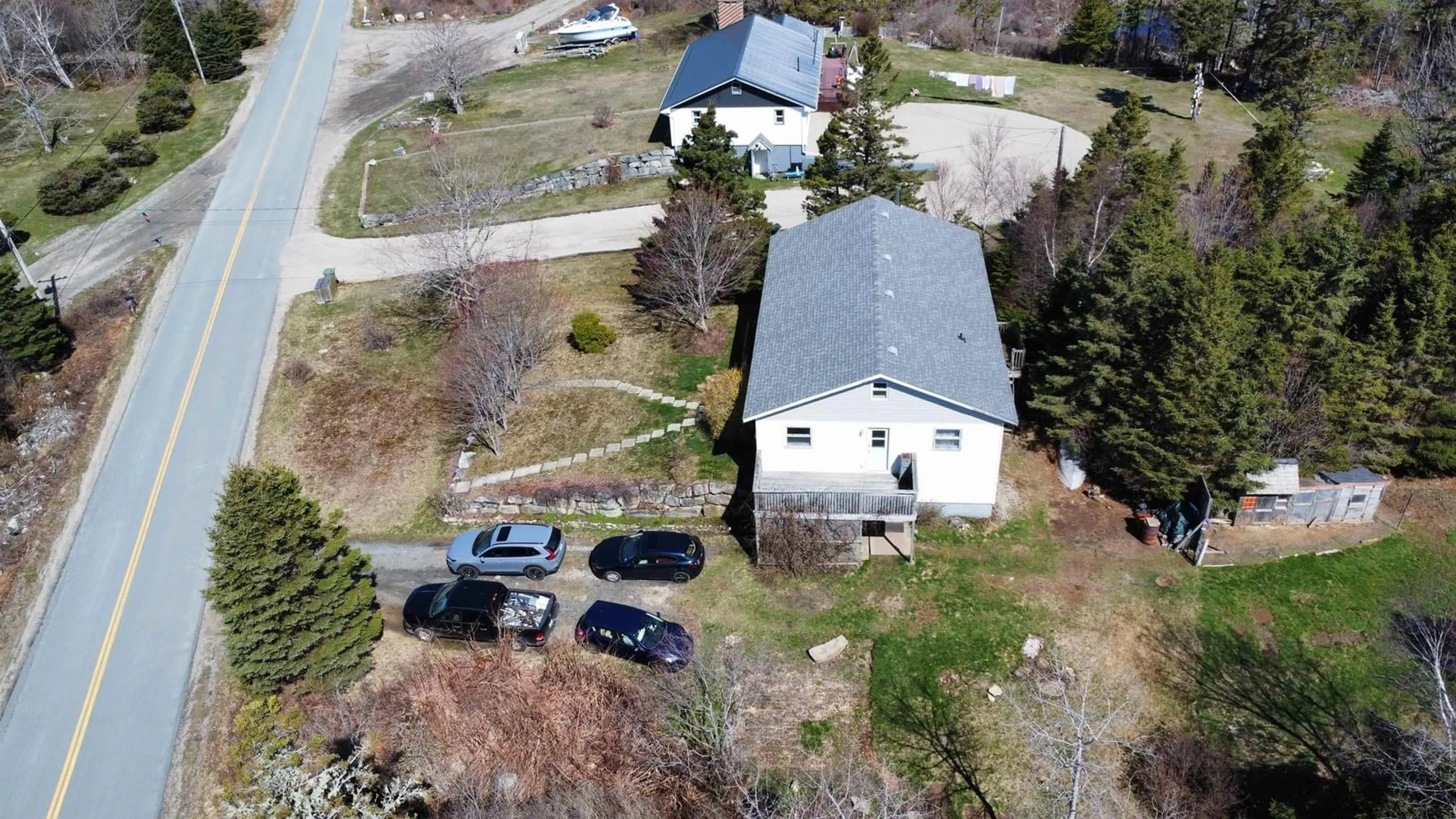 A pic from outside/outdoor area/front of a property/back of a property/a pic from drone, street for 239 New Harbour Rd, Blandford Nova Scotia B0J 1T0