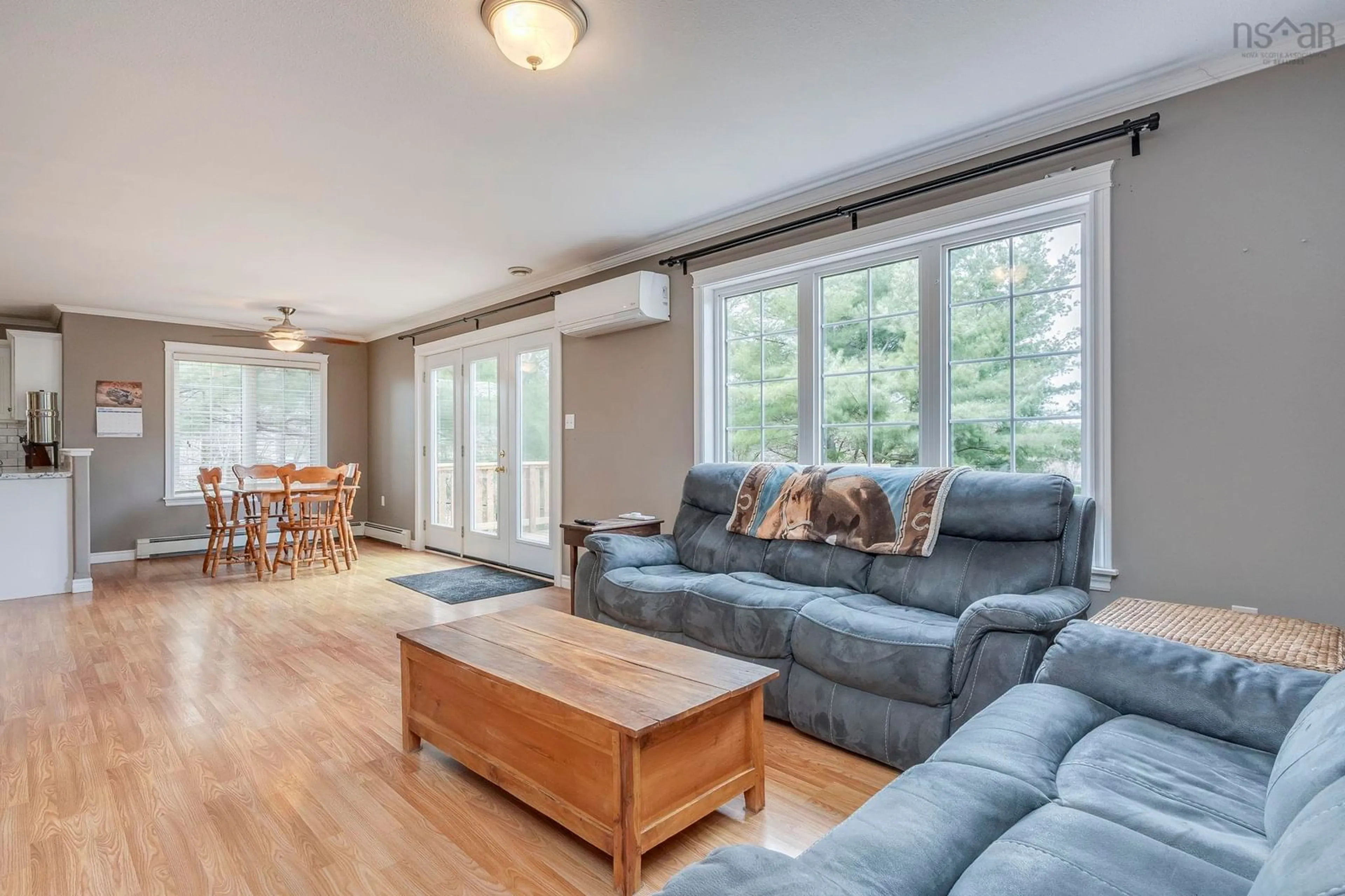 Living room with furniture, wood/laminate floor for 1835 Acadia Dr, Kingston Nova Scotia B0P 1R0