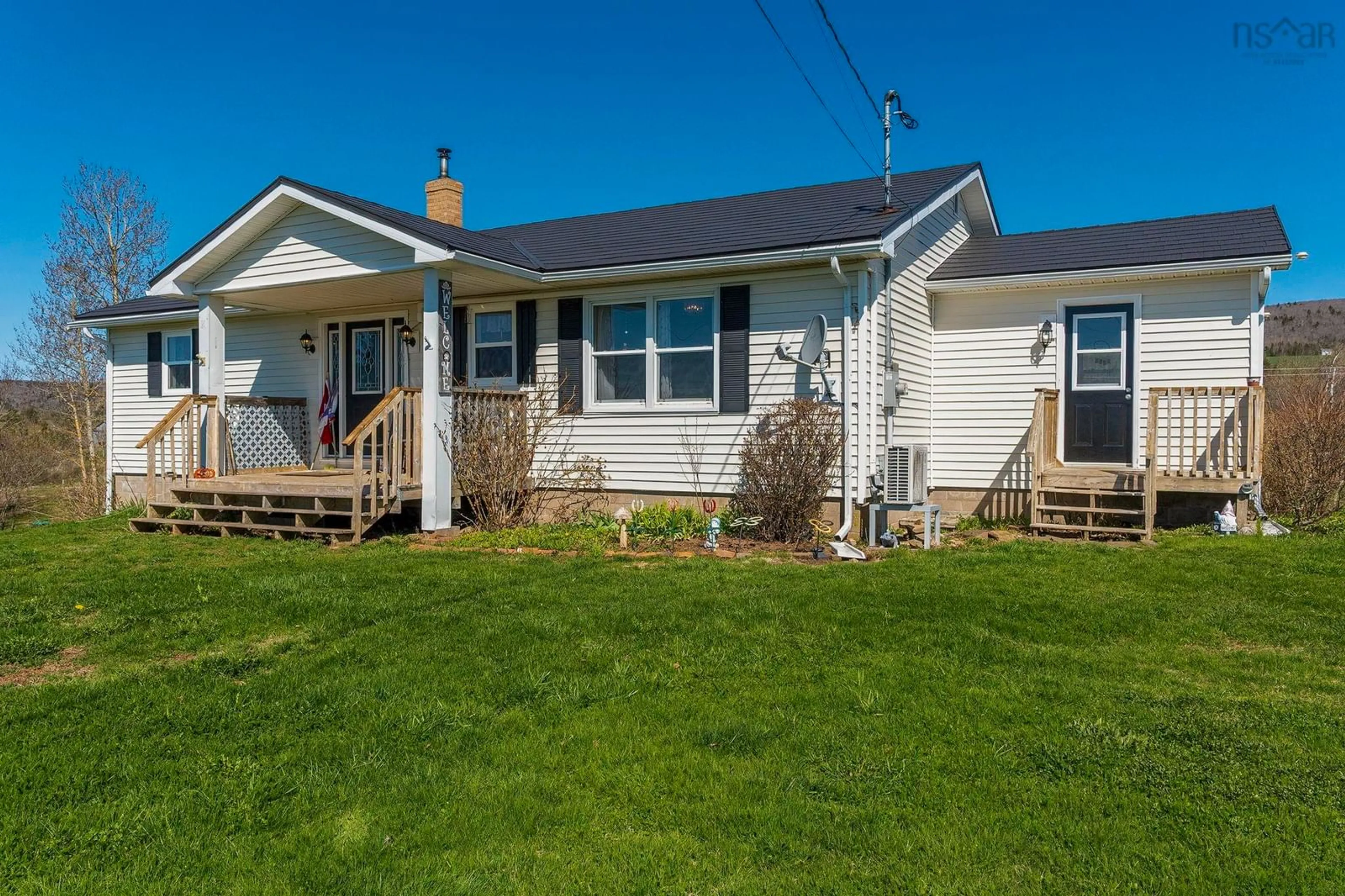 Home with vinyl exterior material, street for 427 Brooklyn Rd, Brooklyn Nova Scotia B0S 1M0