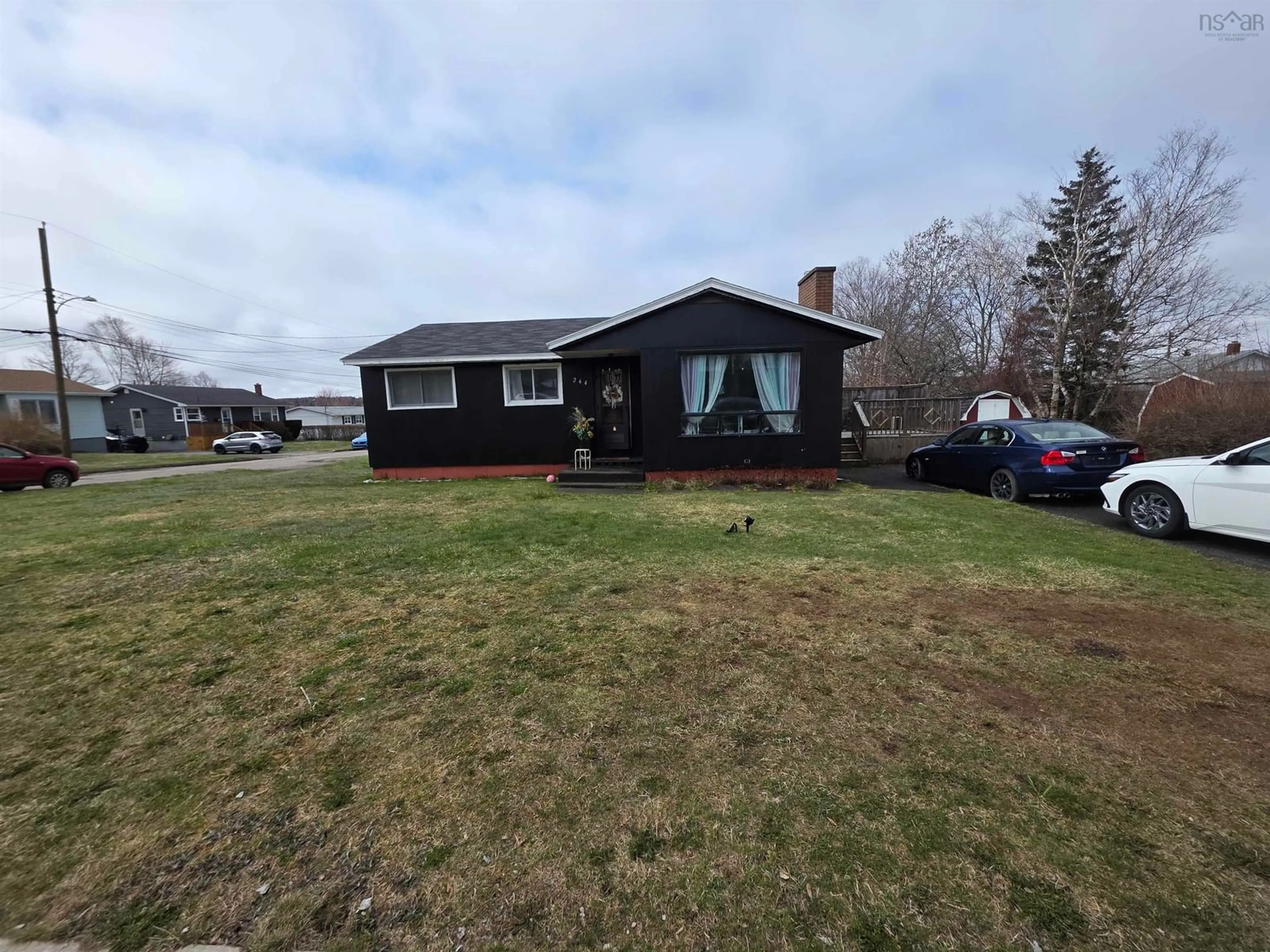 A pic from outside/outdoor area/front of a property/back of a property/a pic from drone, unknown for 244 Ashby Rd, Sydney Nova Scotia B1P 2S9