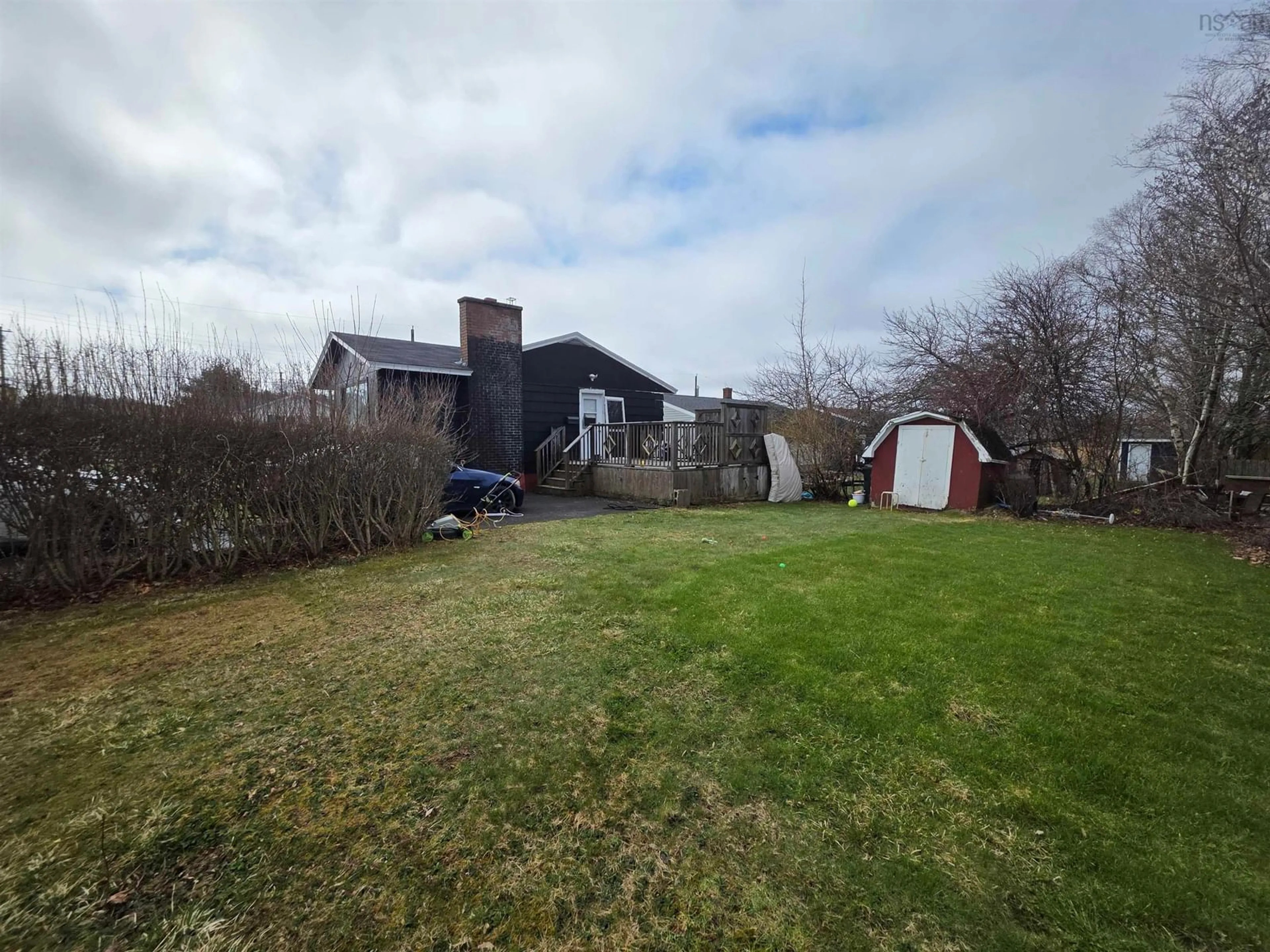 A pic from outside/outdoor area/front of a property/back of a property/a pic from drone, unknown for 244 Ashby Rd, Sydney Nova Scotia B1P 2S9