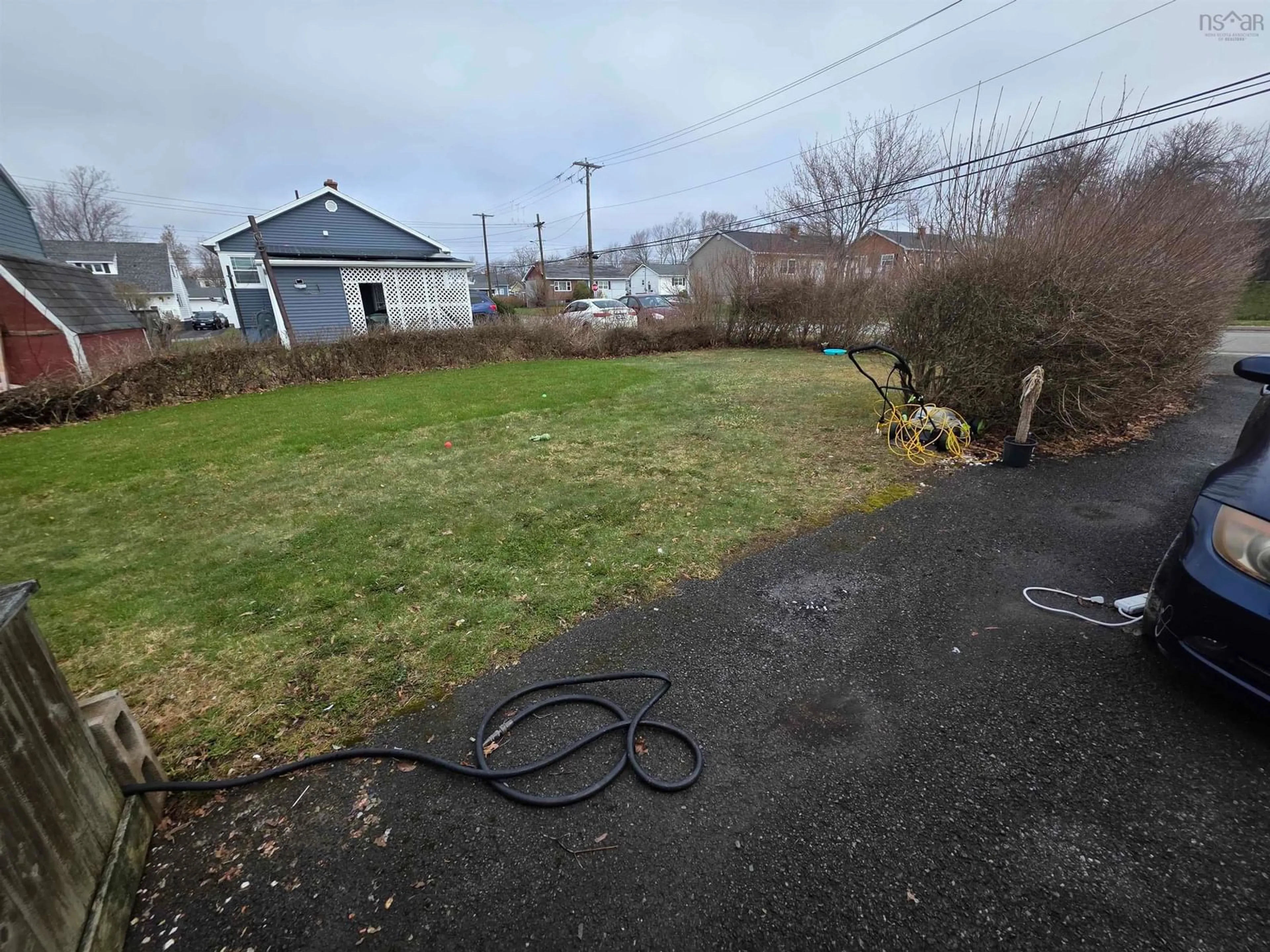 A pic from outside/outdoor area/front of a property/back of a property/a pic from drone, unknown for 244 Ashby Rd, Sydney Nova Scotia B1P 2S9