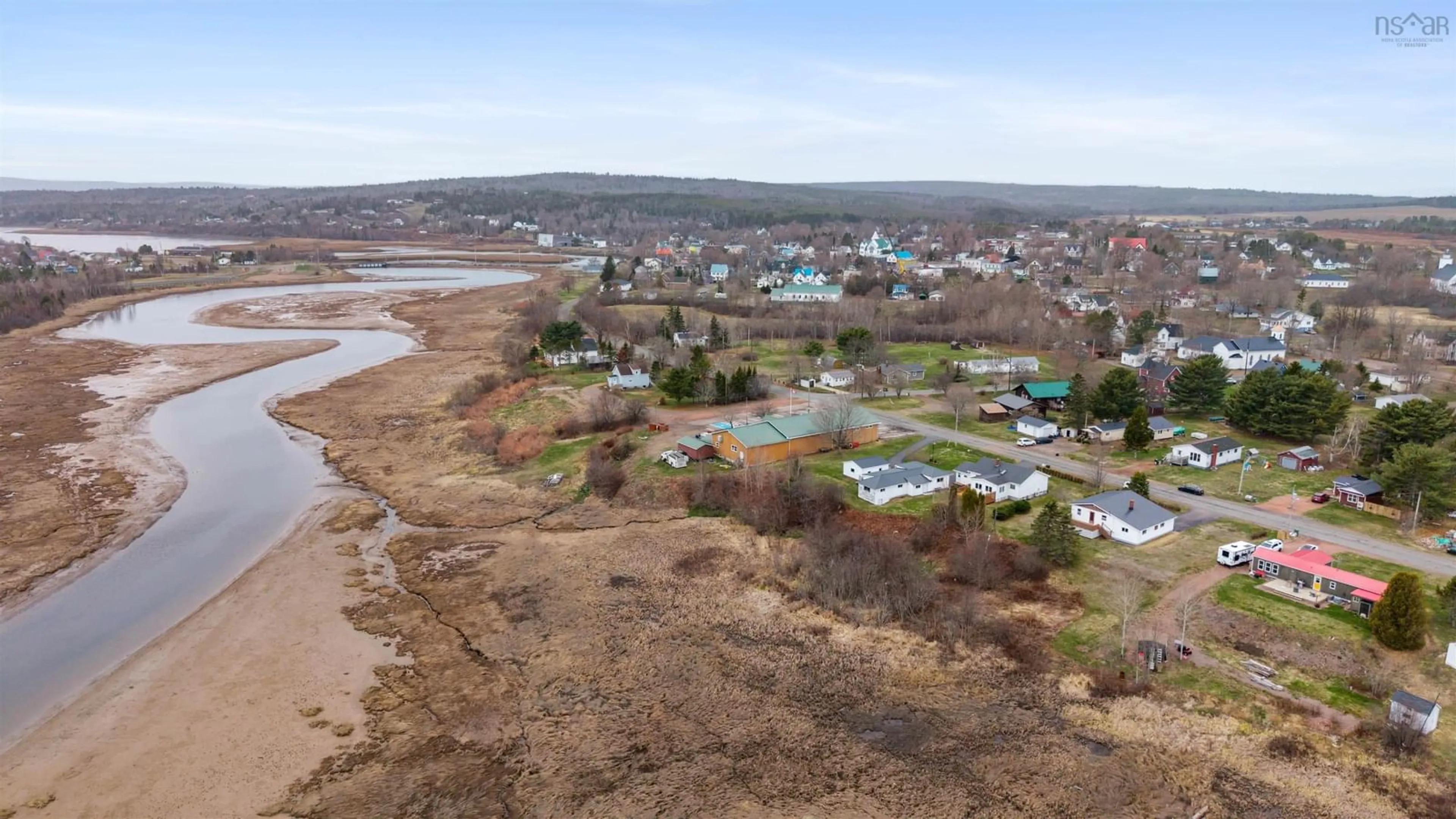 A pic from outside/outdoor area/front of a property/back of a property/a pic from drone, water/lake/river/ocean view for 284 Willow St, Parrsboro Nova Scotia B0M 1S0