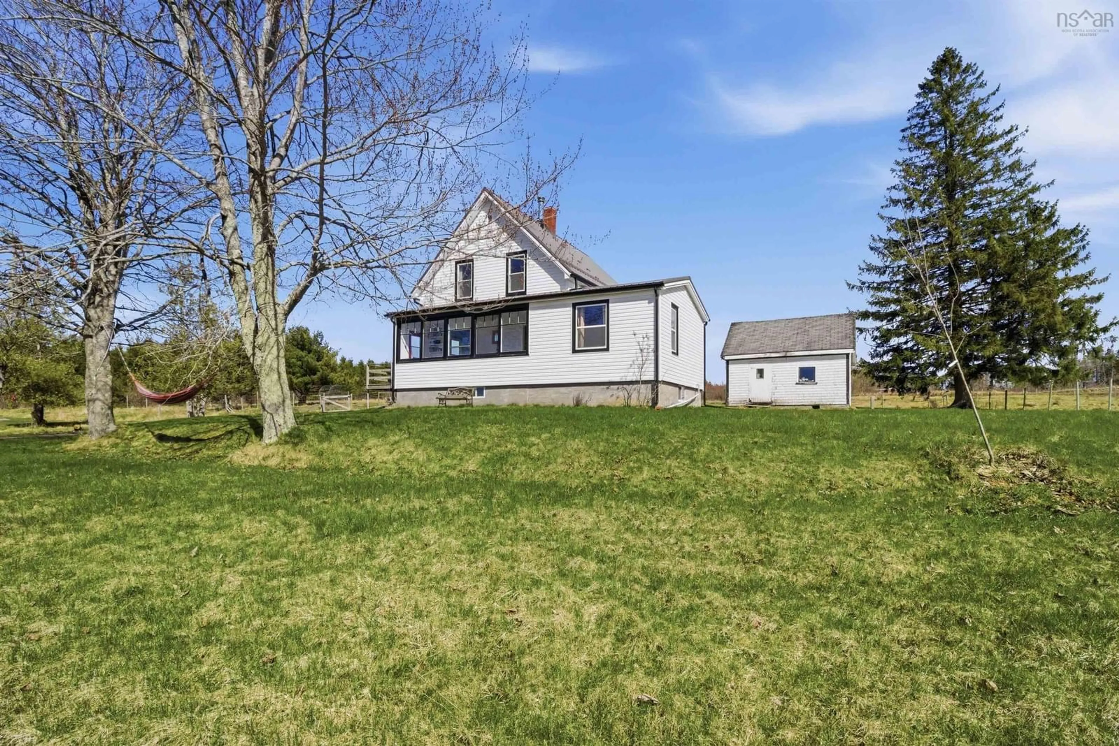 A pic from outside/outdoor area/front of a property/back of a property/a pic from drone, unknown for 21077 Highway 2, Shubenacadie Nova Scotia B0N 2H0