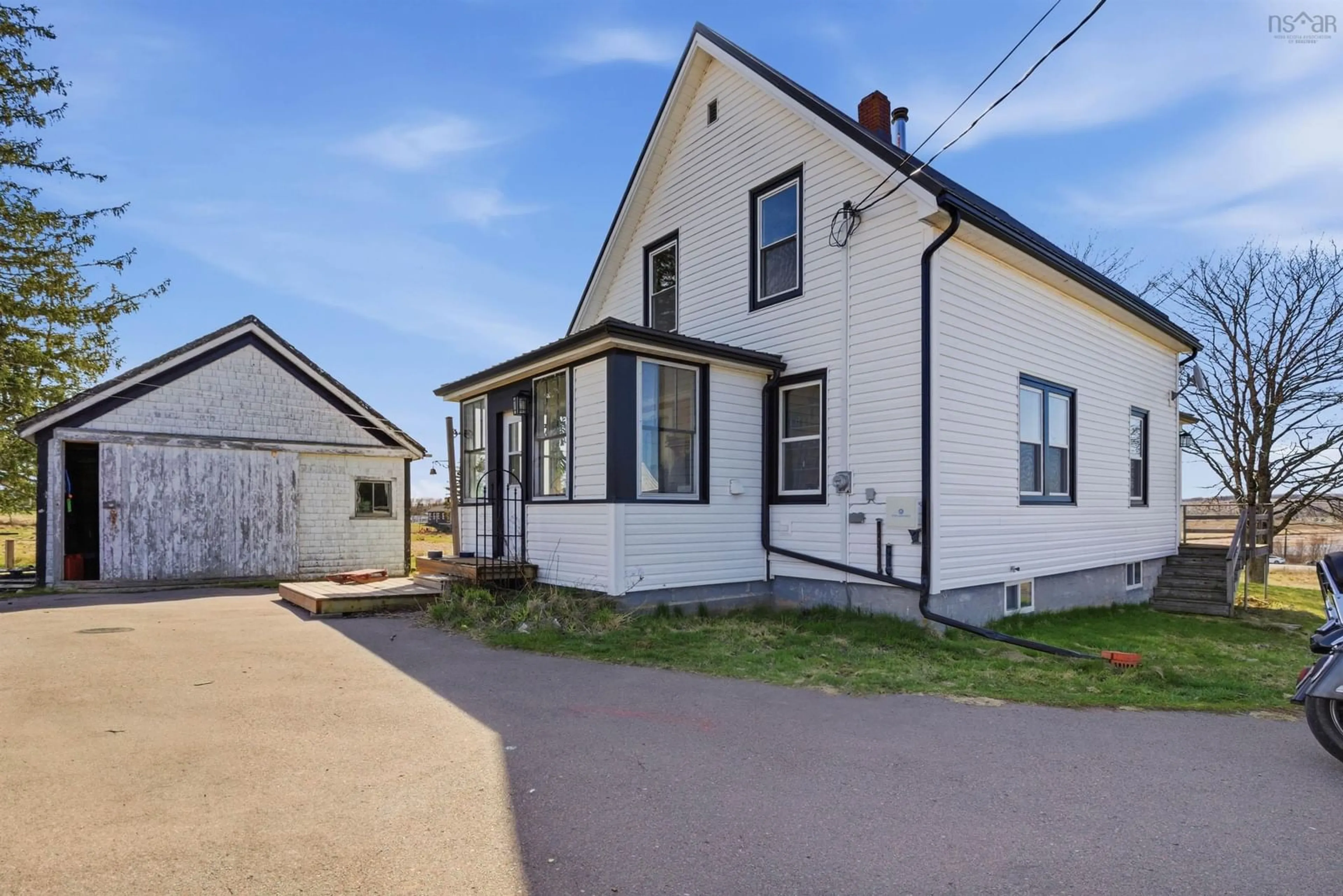 A pic from outside/outdoor area/front of a property/back of a property/a pic from drone, street for 21077 Highway 2, Shubenacadie Nova Scotia B0N 2H0