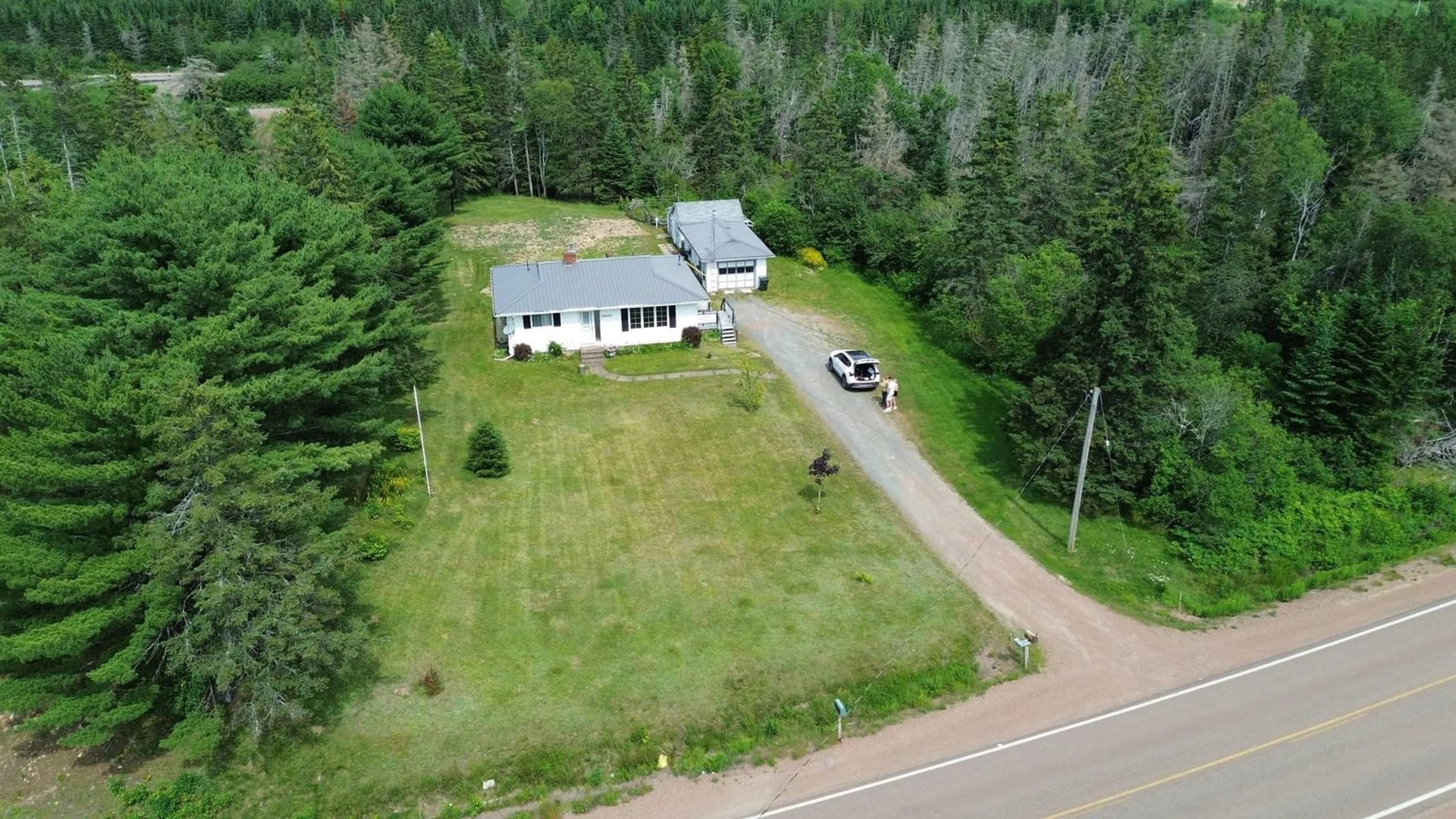 A pic from outside/outdoor area/front of a property/back of a property/a pic from drone, unknown for 2842 Highway 311, Upper North River Nova Scotia B6L 6J7
