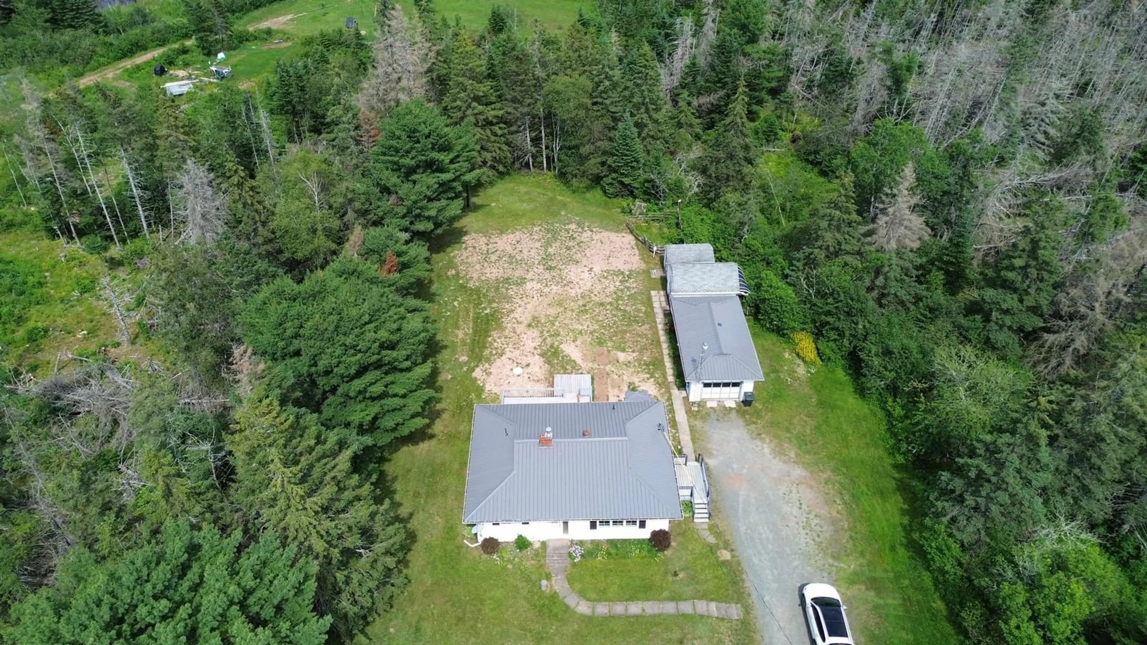A pic from outside/outdoor area/front of a property/back of a property/a pic from drone, unknown for 2842 Highway 311, Upper North River Nova Scotia B6L 6J7