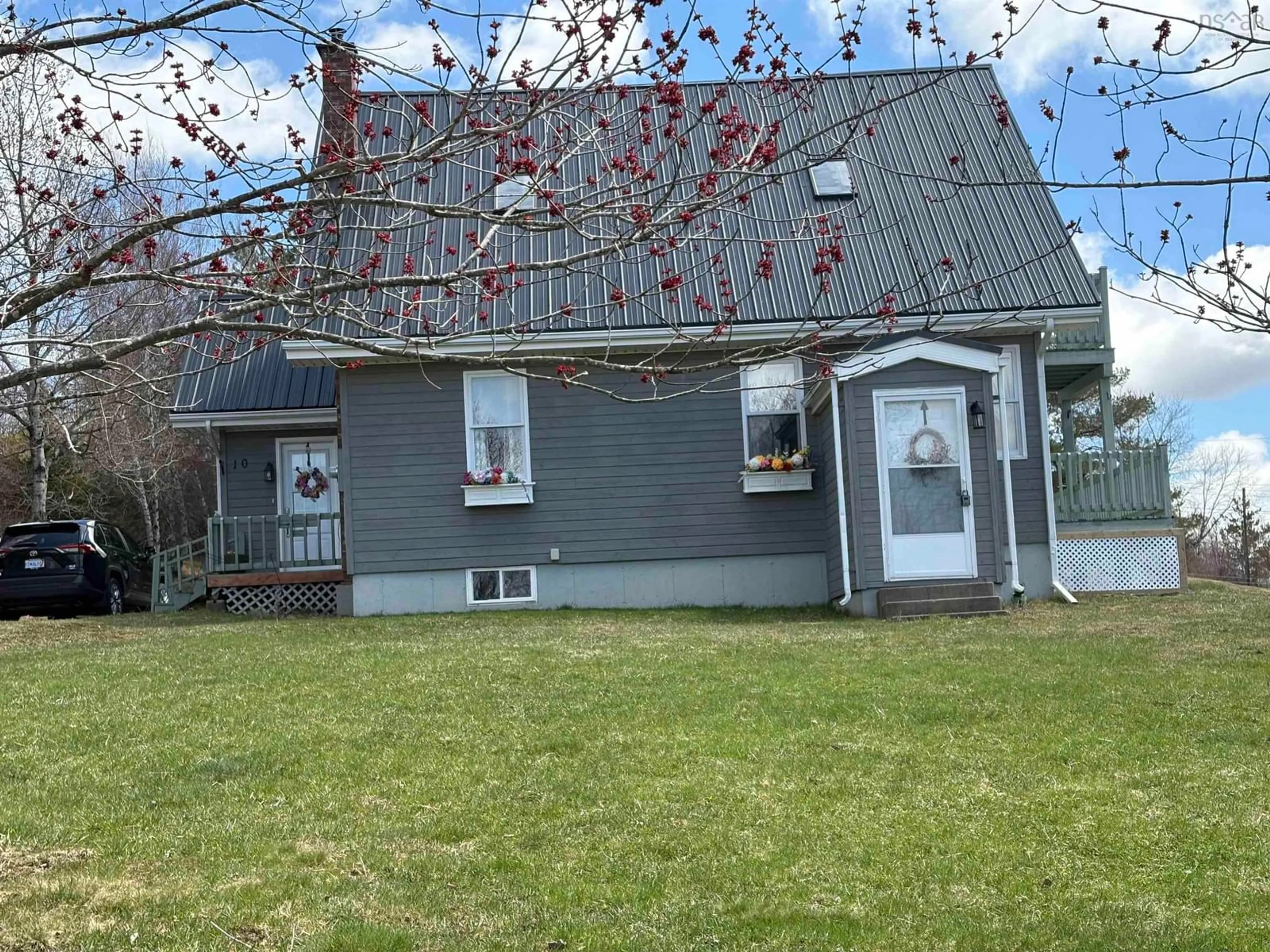 Home with vinyl exterior material, street for 10 Egerton St, Trenton Nova Scotia B0K 1X0