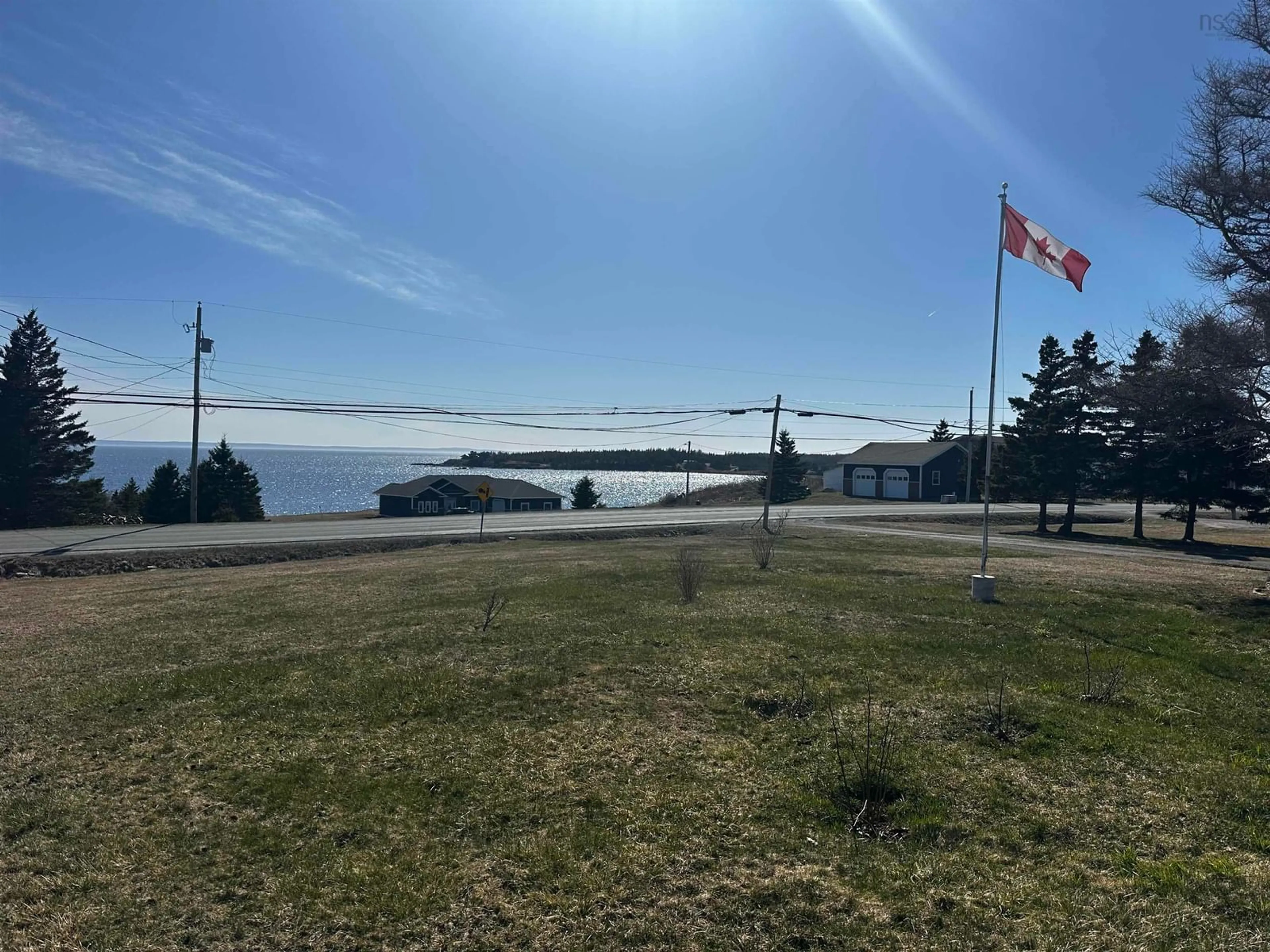A pic from outside/outdoor area/front of a property/back of a property/a pic from drone, water/lake/river/ocean view for 1659 Ns-206 Hwy, West Arichat Nova Scotia B0E 3J0