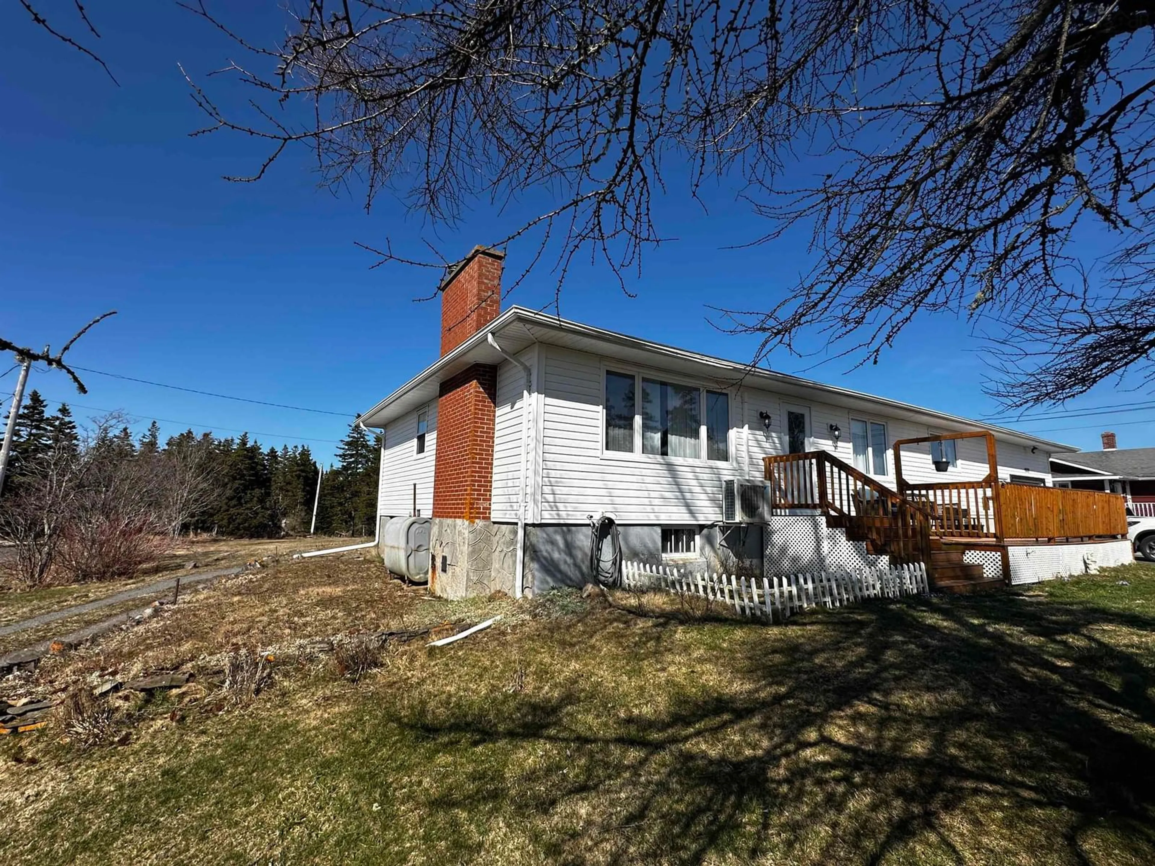 A pic from outside/outdoor area/front of a property/back of a property/a pic from drone, street for 1659 Ns-206 Hwy, West Arichat Nova Scotia B0E 3J0