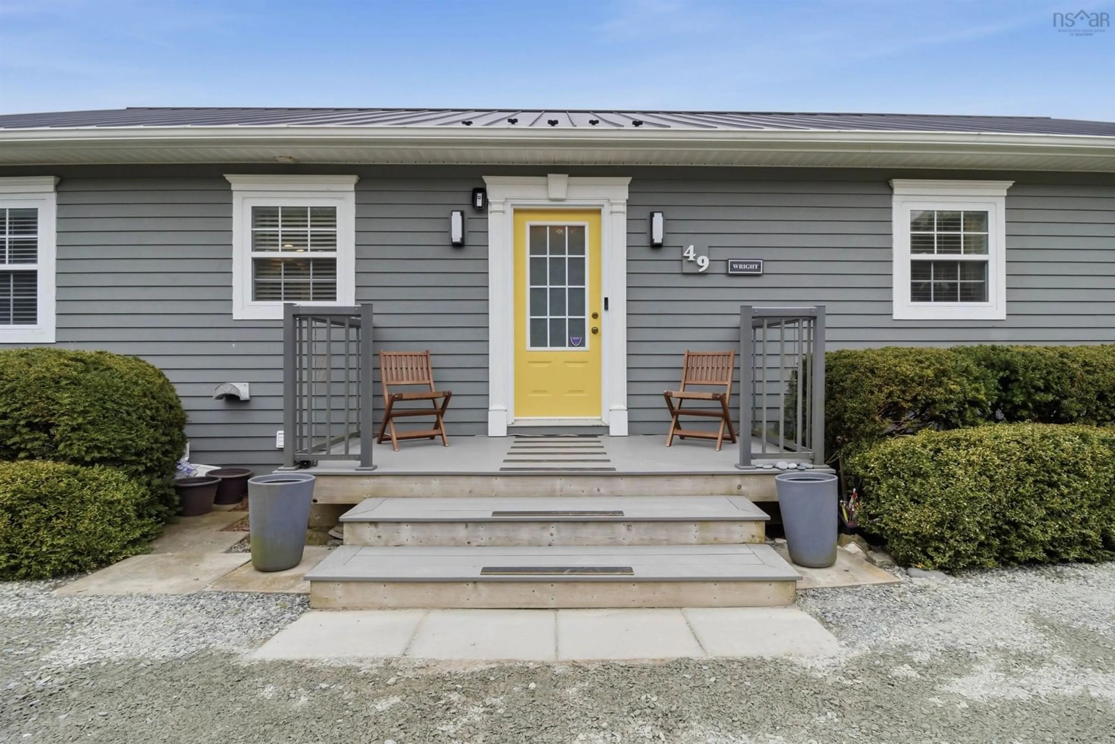 Home with vinyl exterior material, street for 49 Kaakwogook Way, Clam Bay Nova Scotia B0J 2L0