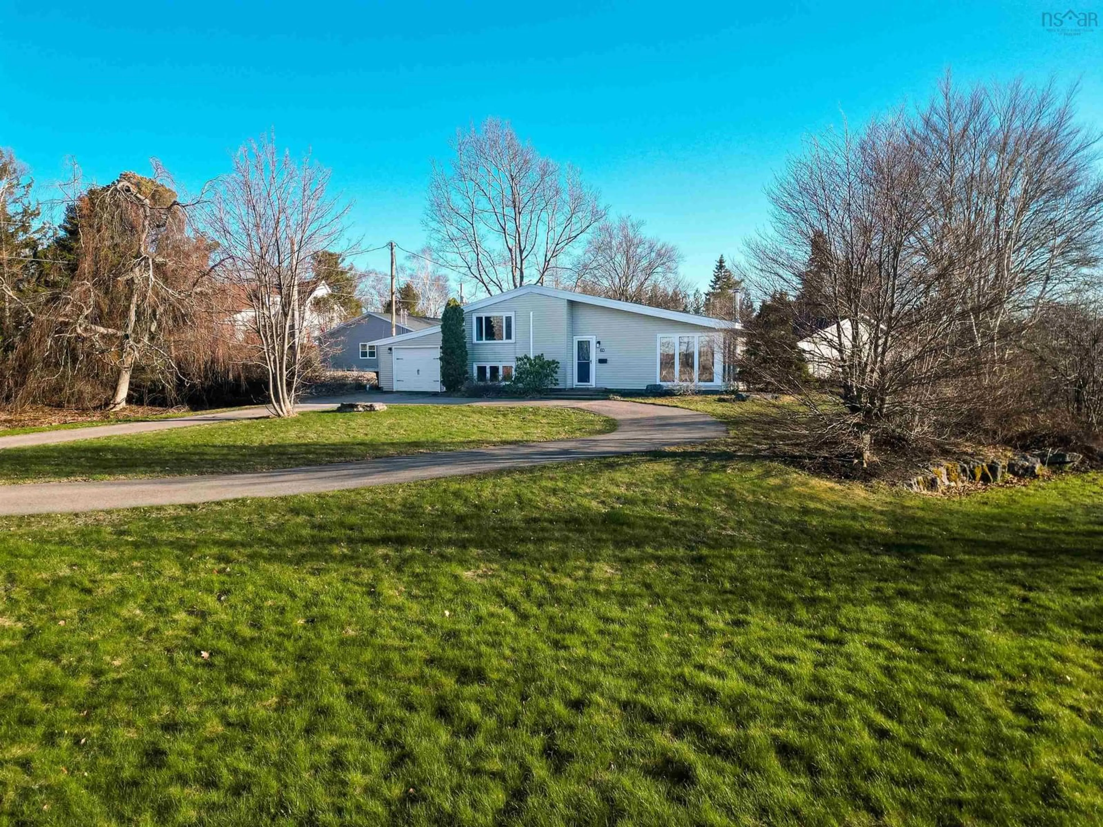 A pic from outside/outdoor area/front of a property/back of a property/a pic from drone, street for 60 Riverside Dr, Sydney River Nova Scotia B1S 1G4