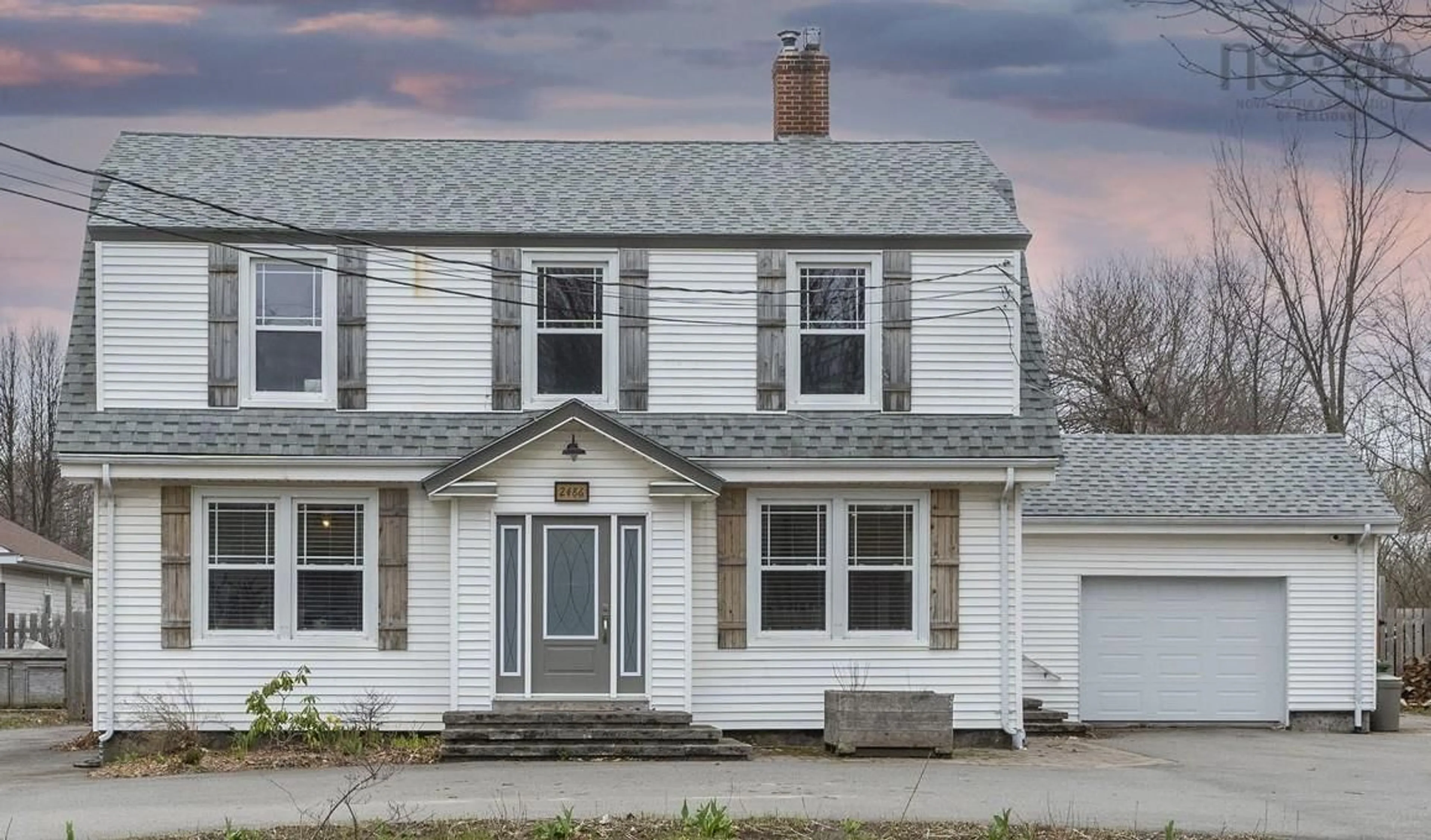 Home with vinyl exterior material, street for 2486 Highway 1 Hwy, Aylesford Nova Scotia B0P 1C0