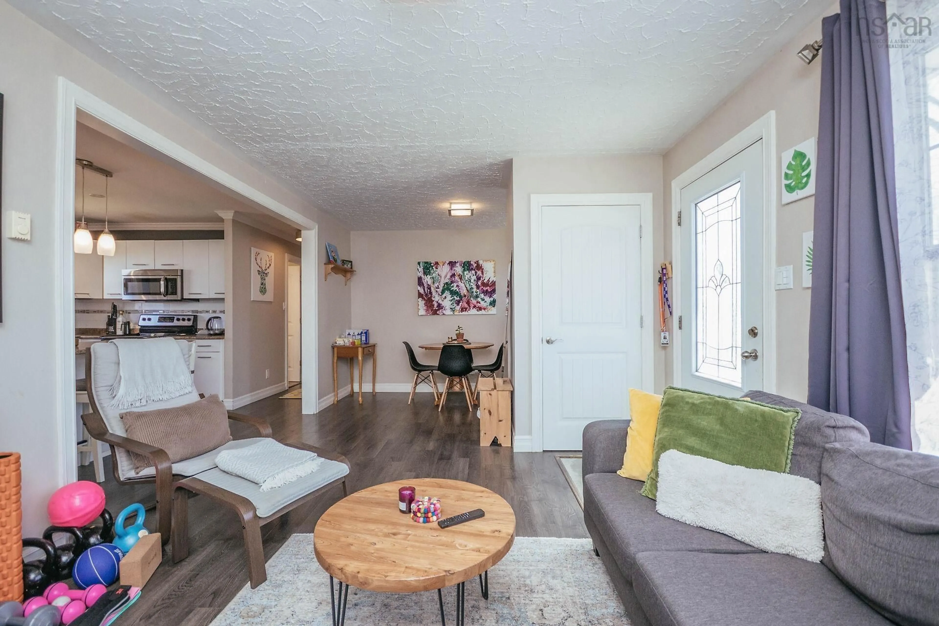 Living room with furniture, wood/laminate floor for 19 Circle Dr, Halifax Nova Scotia B3P 1J9