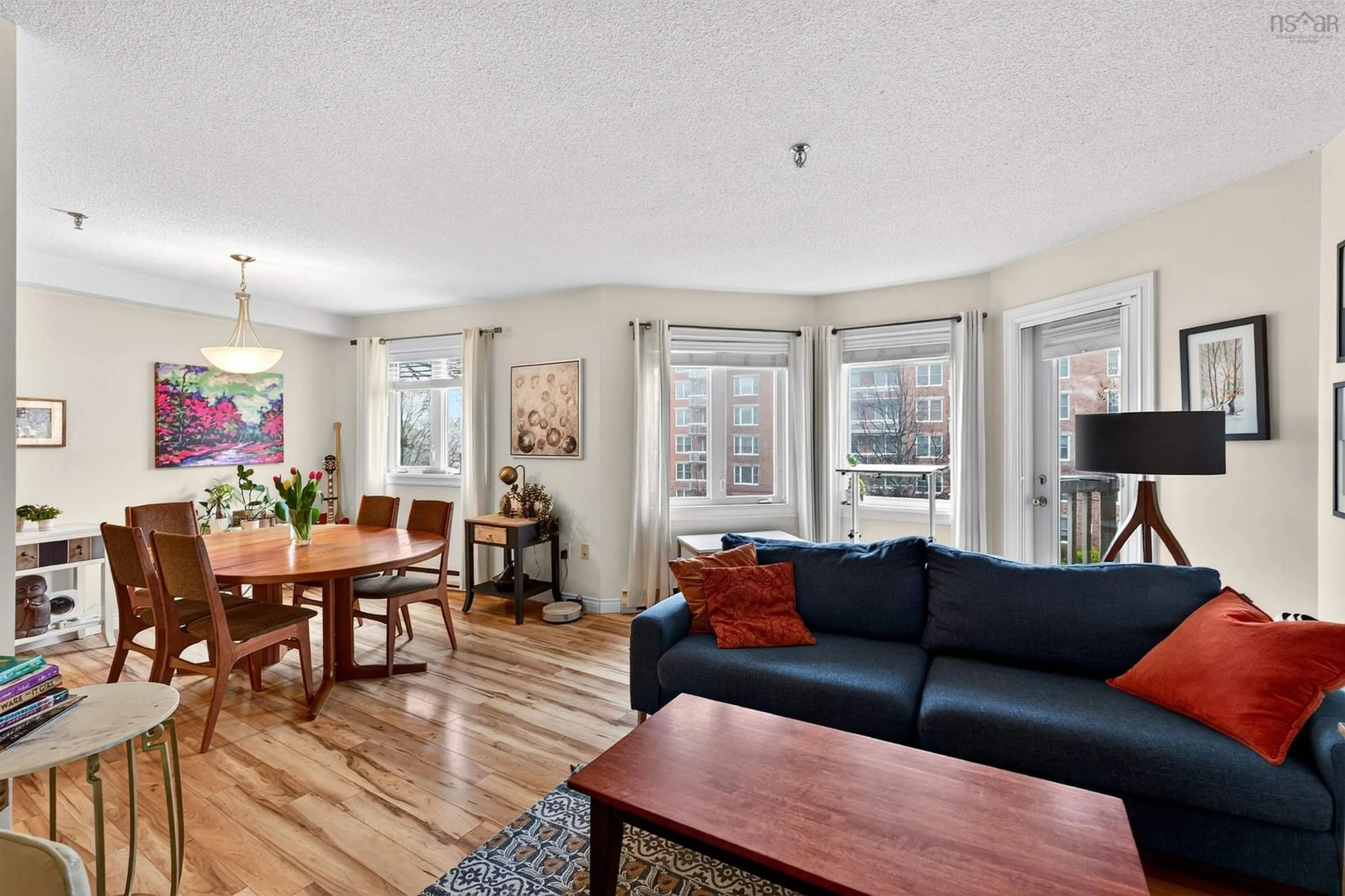 Living room with furniture, wood/laminate floor for 80 Spinnaker Dr #203, Halifax Nova Scotia B3N 3B5