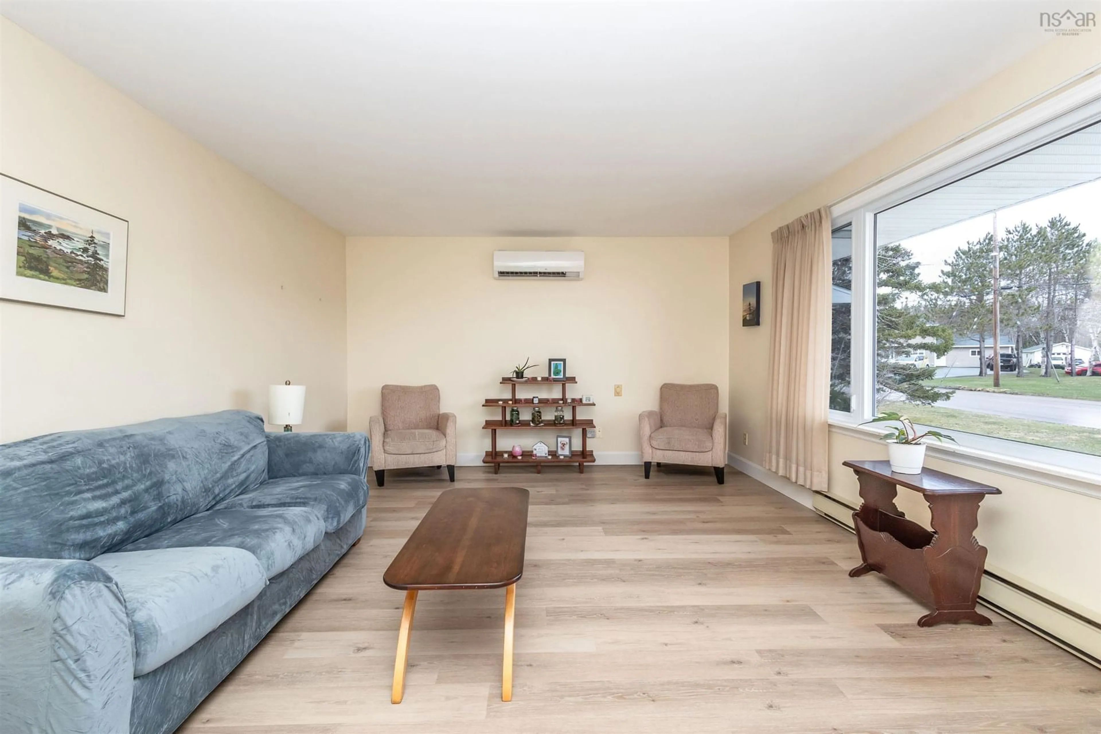 Living room with furniture, wood/laminate floor for 69 Daley Dr, Coxheath Nova Scotia B1R 2C6