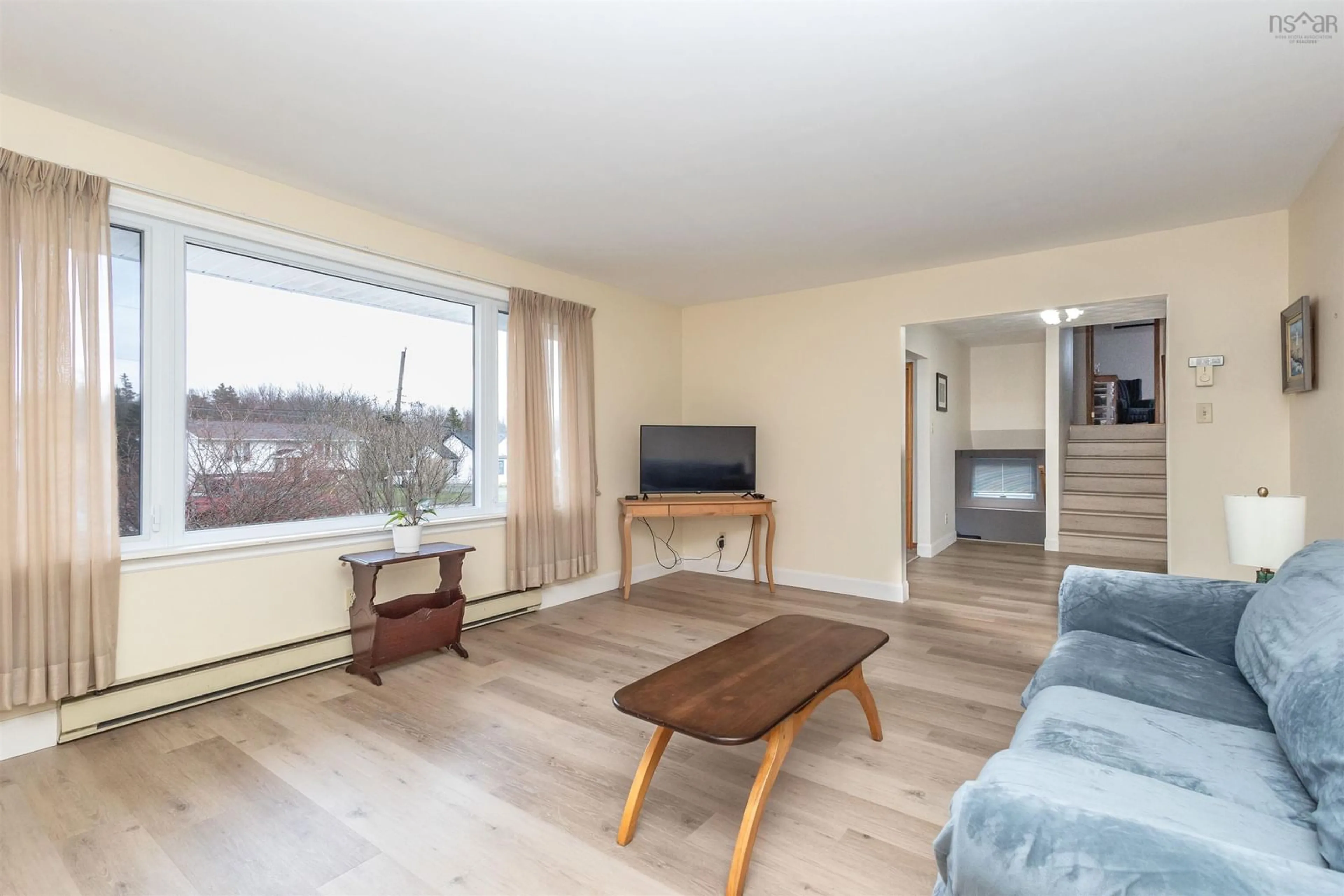 Living room with furniture, wood/laminate floor for 69 Daley Dr, Coxheath Nova Scotia B1R 2C6