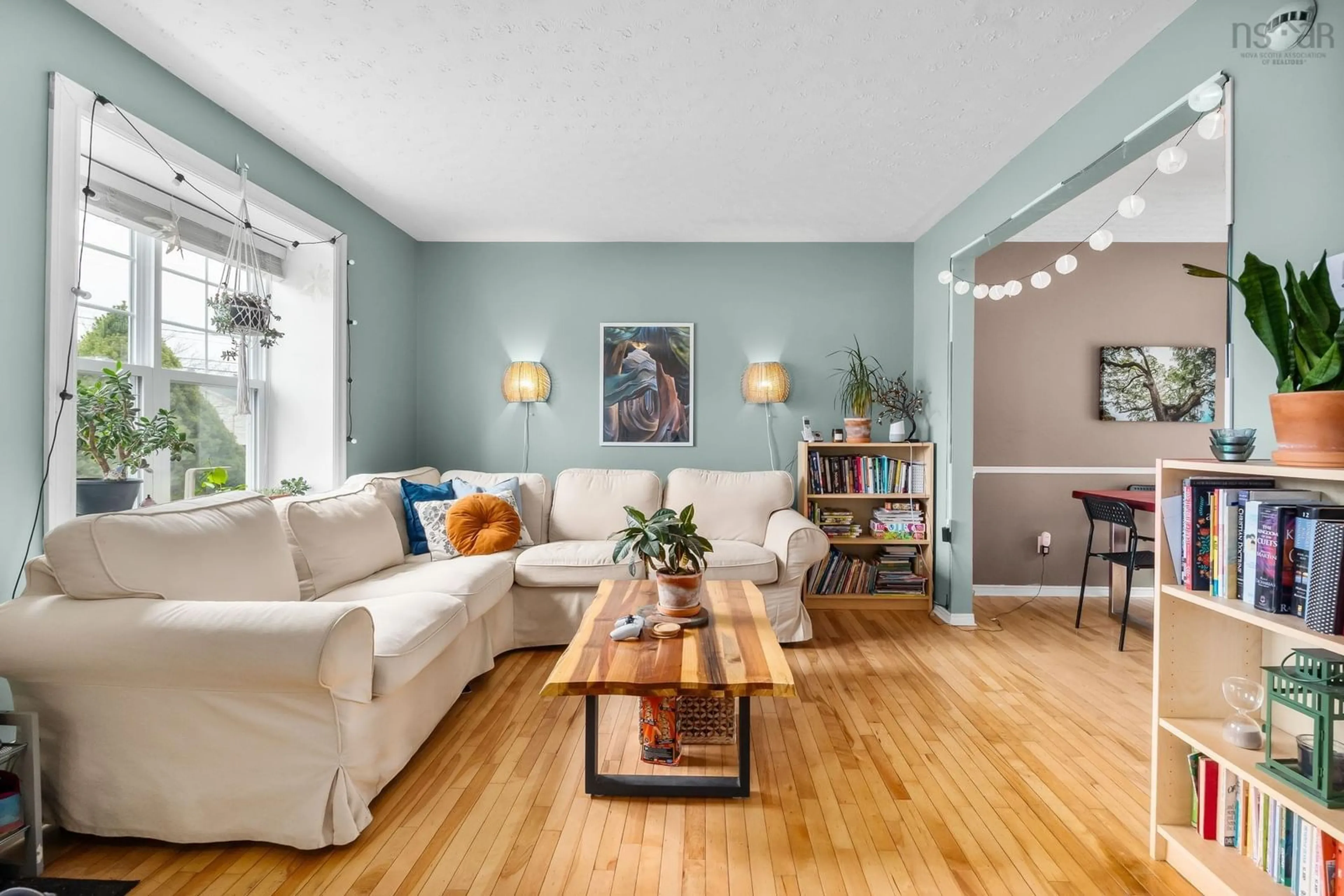 Living room with furniture, wood/laminate floor for 47 Governor's Lake Dr, Timberlea Nova Scotia B3T 1N2