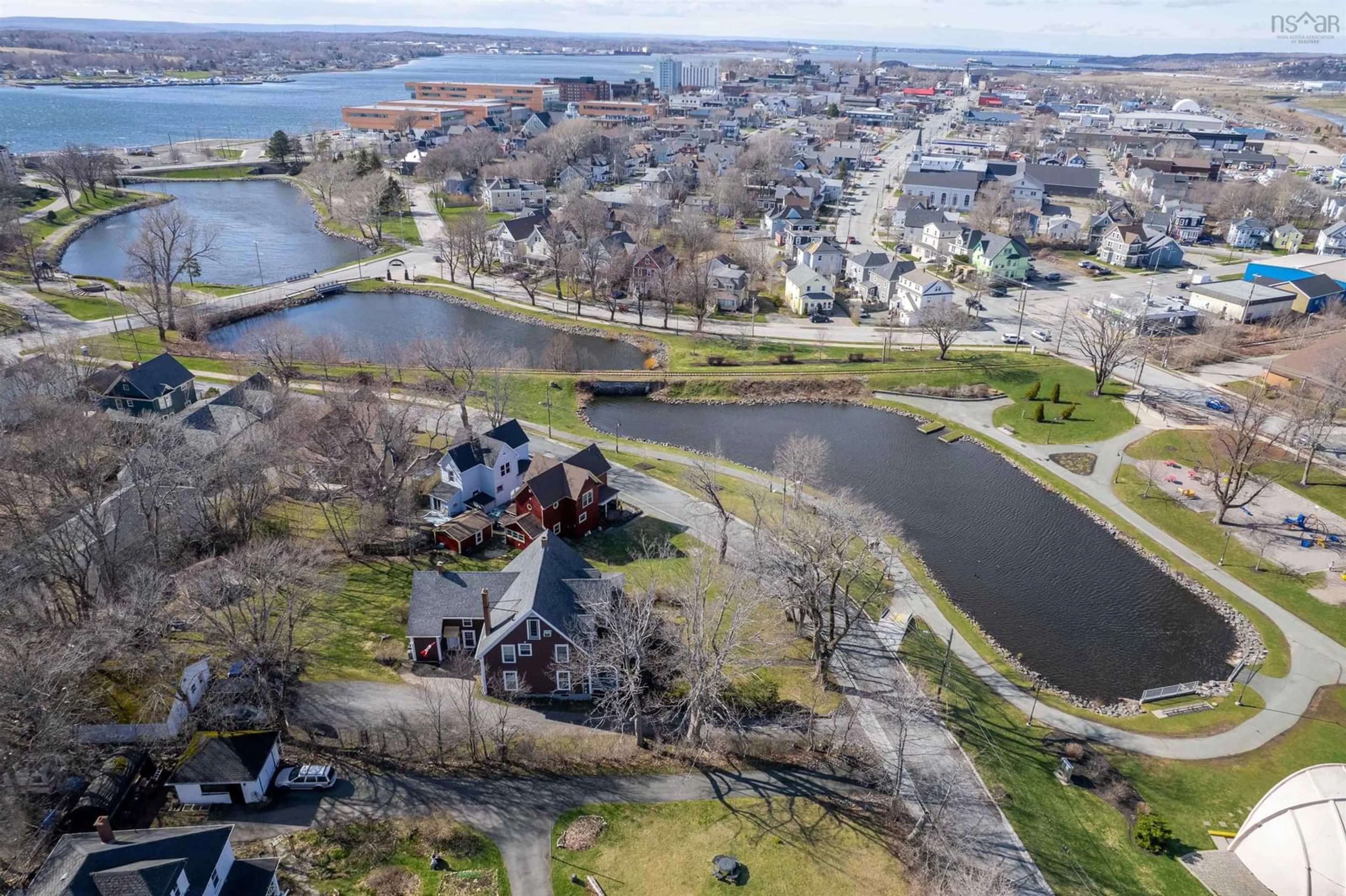 A pic from outside/outdoor area/front of a property/back of a property/a pic from drone, water/lake/river/ocean view for 148 Crescent St, Sydney Nova Scotia B1S 2Z8