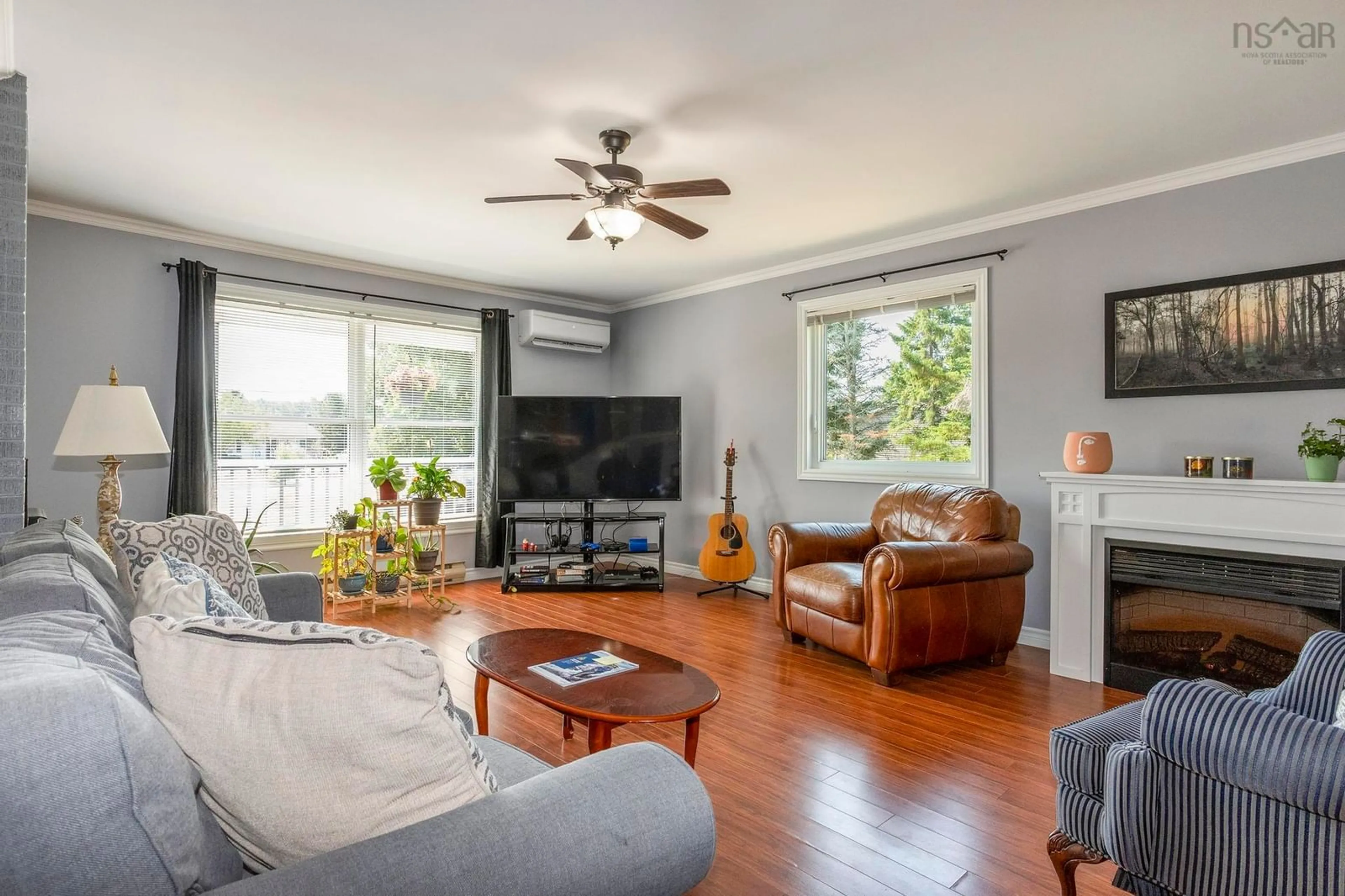 Living room with furniture, wood/laminate floor for 536 Salmon River Rd, Salmon River Nova Scotia B6L 4E4