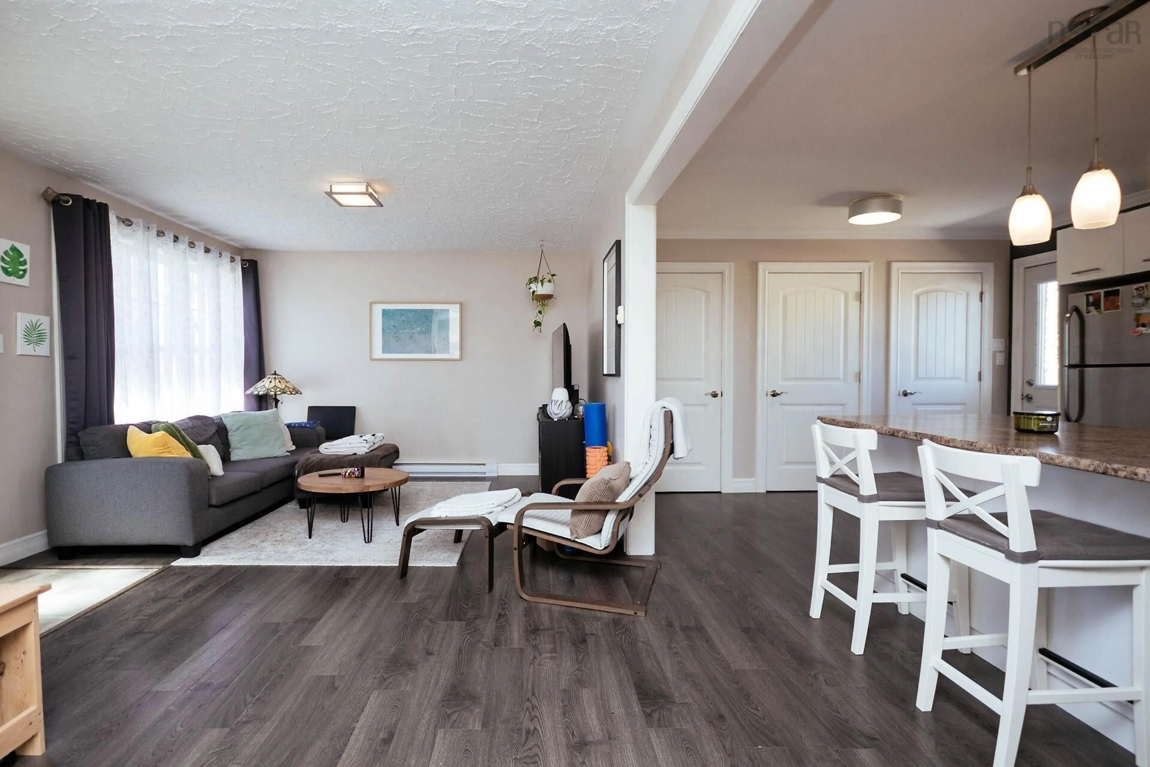 Living room with furniture, wood/laminate floor for 19 Circle Dr, Halifax Nova Scotia B3P 1J9