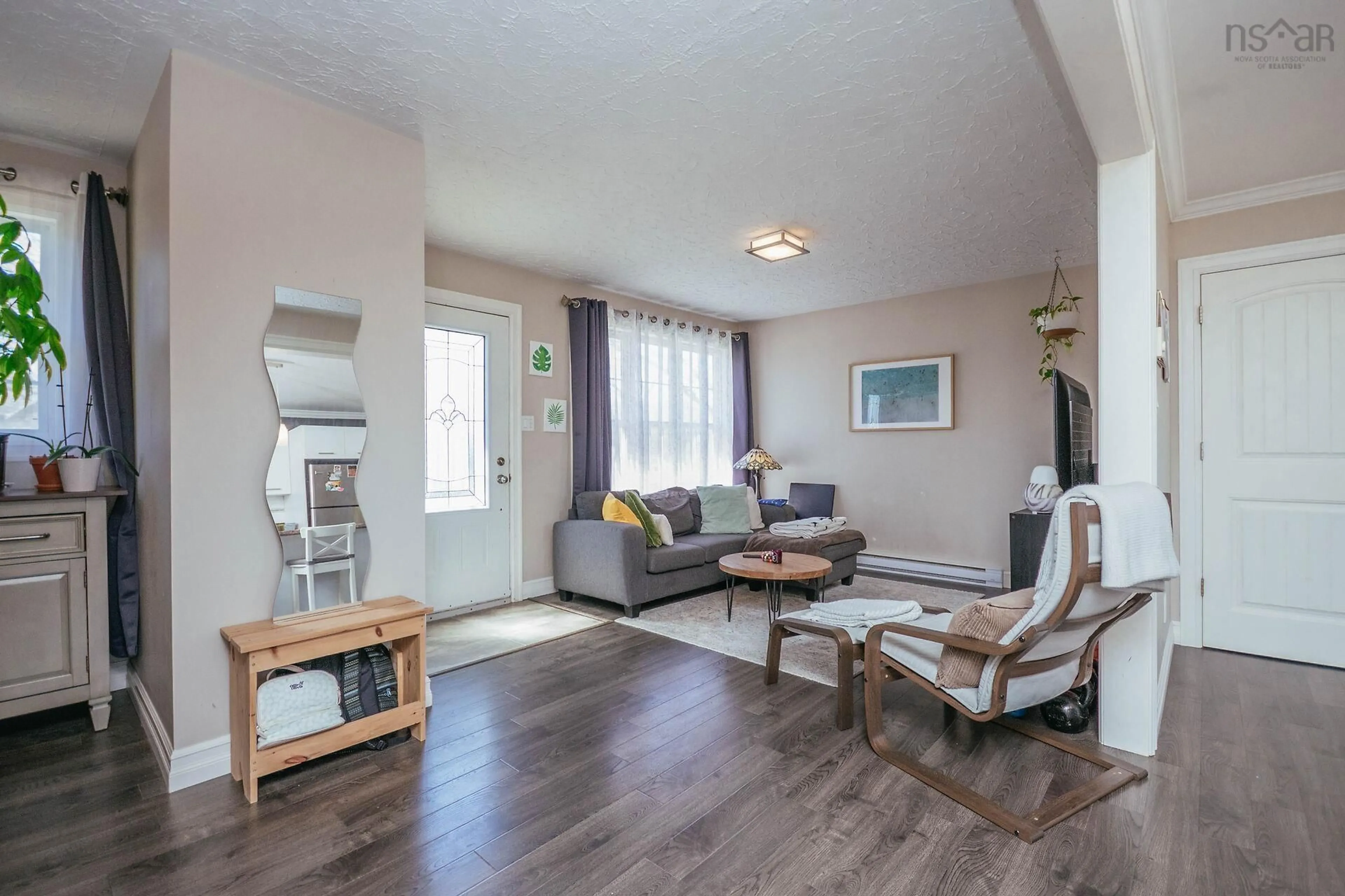 Living room with furniture, wood/laminate floor for 19 Circle Dr, Halifax Nova Scotia B3P 1J9