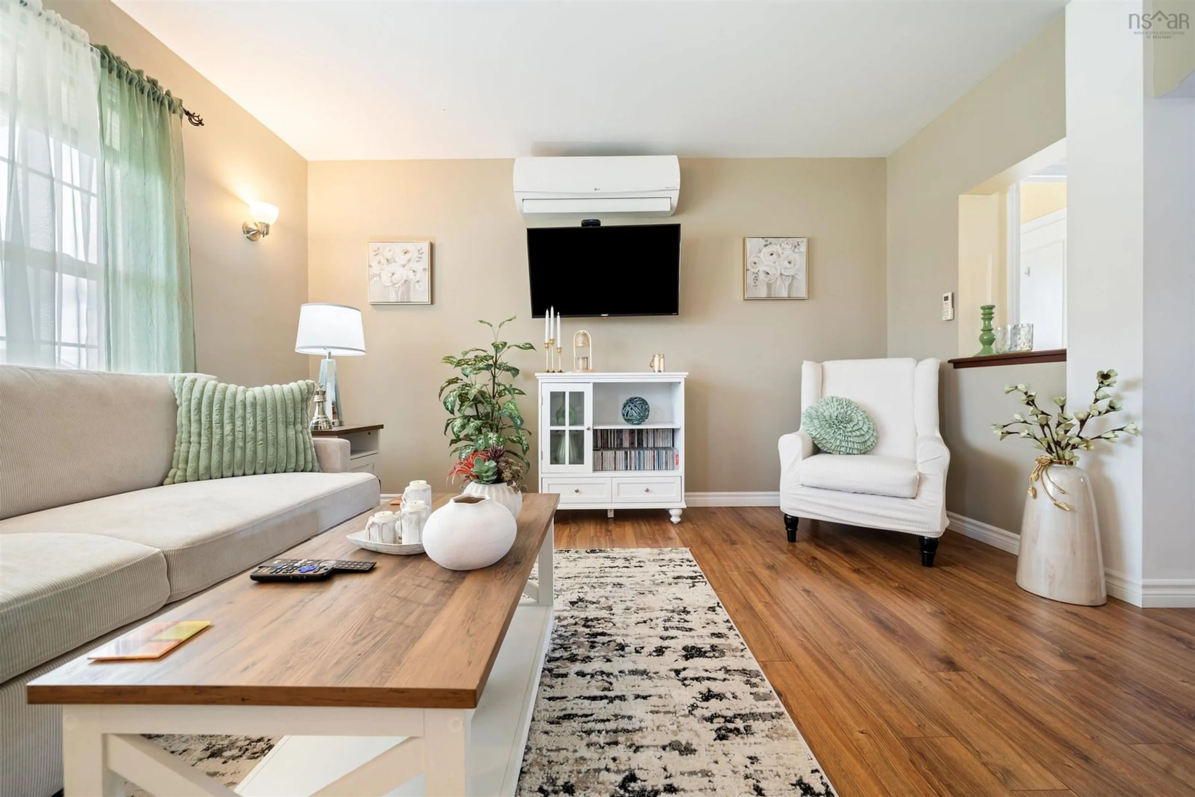 Living room with furniture, wood/laminate floor for 3 Chestnut St, New Glasgow Nova Scotia B2H 0E4