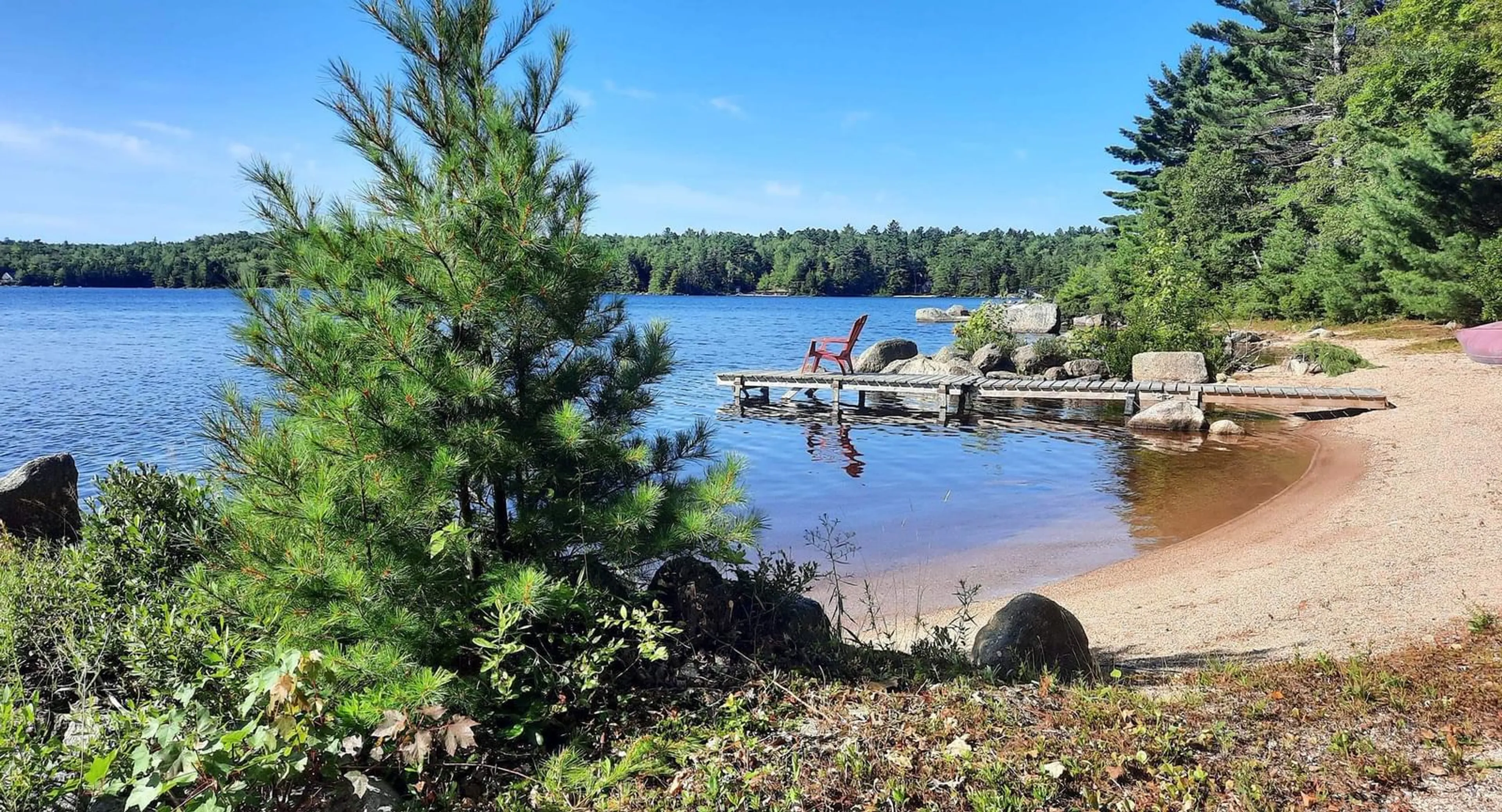 A pic from outside/outdoor area/front of a property/back of a property/a pic from drone, water/lake/river/ocean view for 562 Grand Lake Rd, Virginia East Nova Scotia B0S 1A0