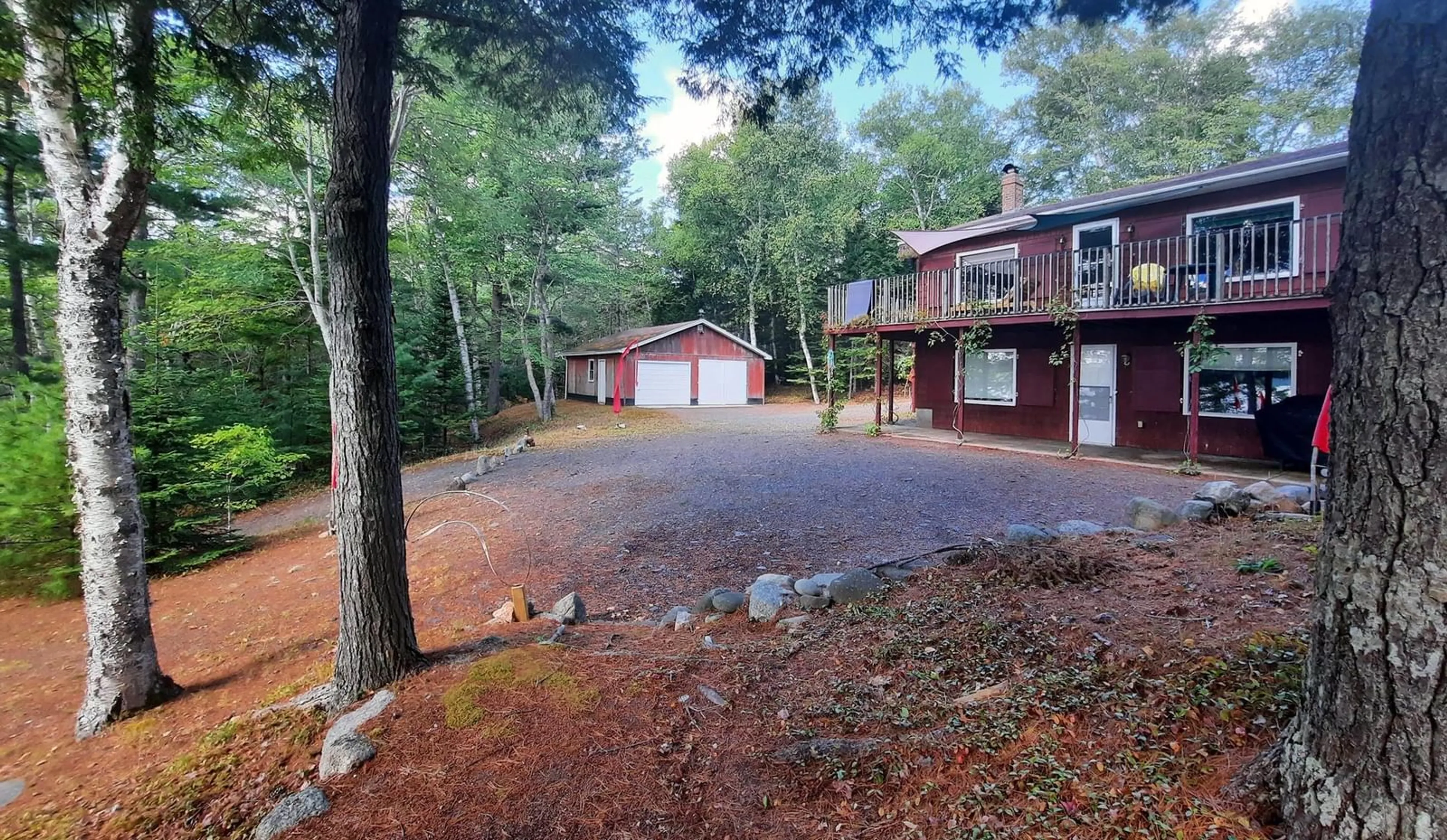 A pic from outside/outdoor area/front of a property/back of a property/a pic from drone, forest/trees view for 562 Grand Lake Rd, Virginia East Nova Scotia B0S 1A0