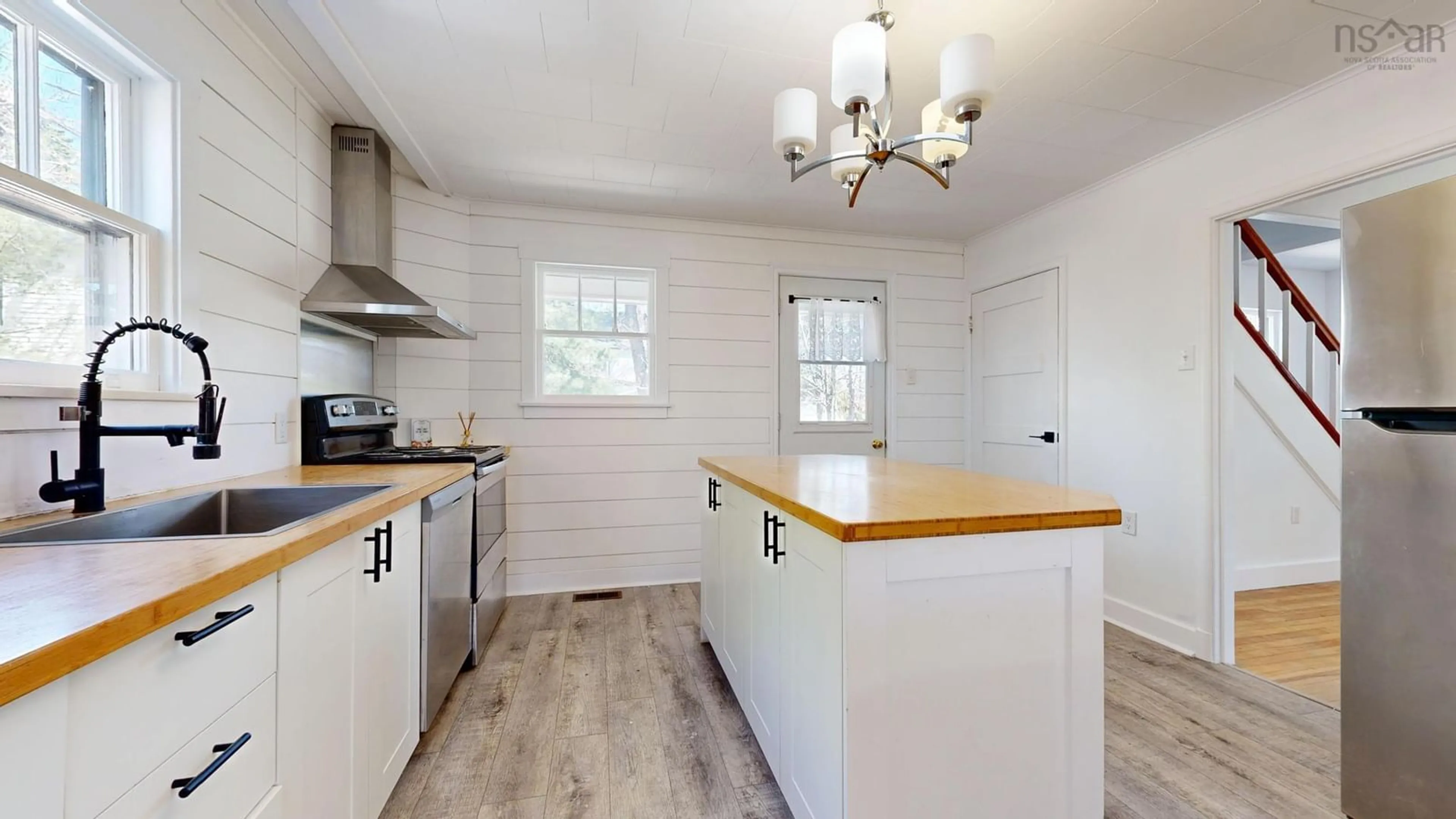 Open concept kitchen, wood/laminate floor for 160 High Street, Bridgewater Nova Scotia B4V 1W3