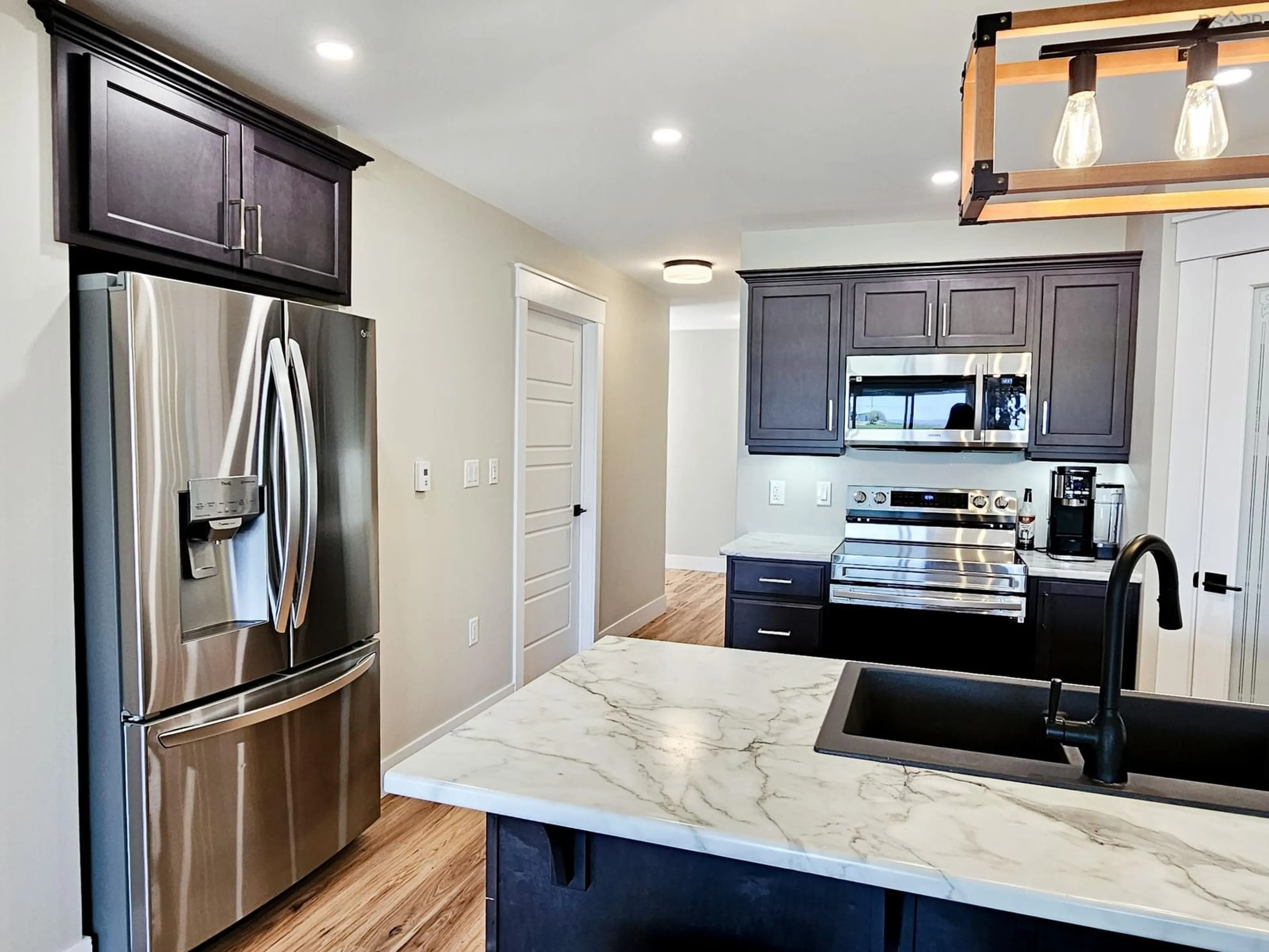 Open concept kitchen, ceramic/tile floor for 79 Kent Rd, Lower Truro Nova Scotia B6L 1L2