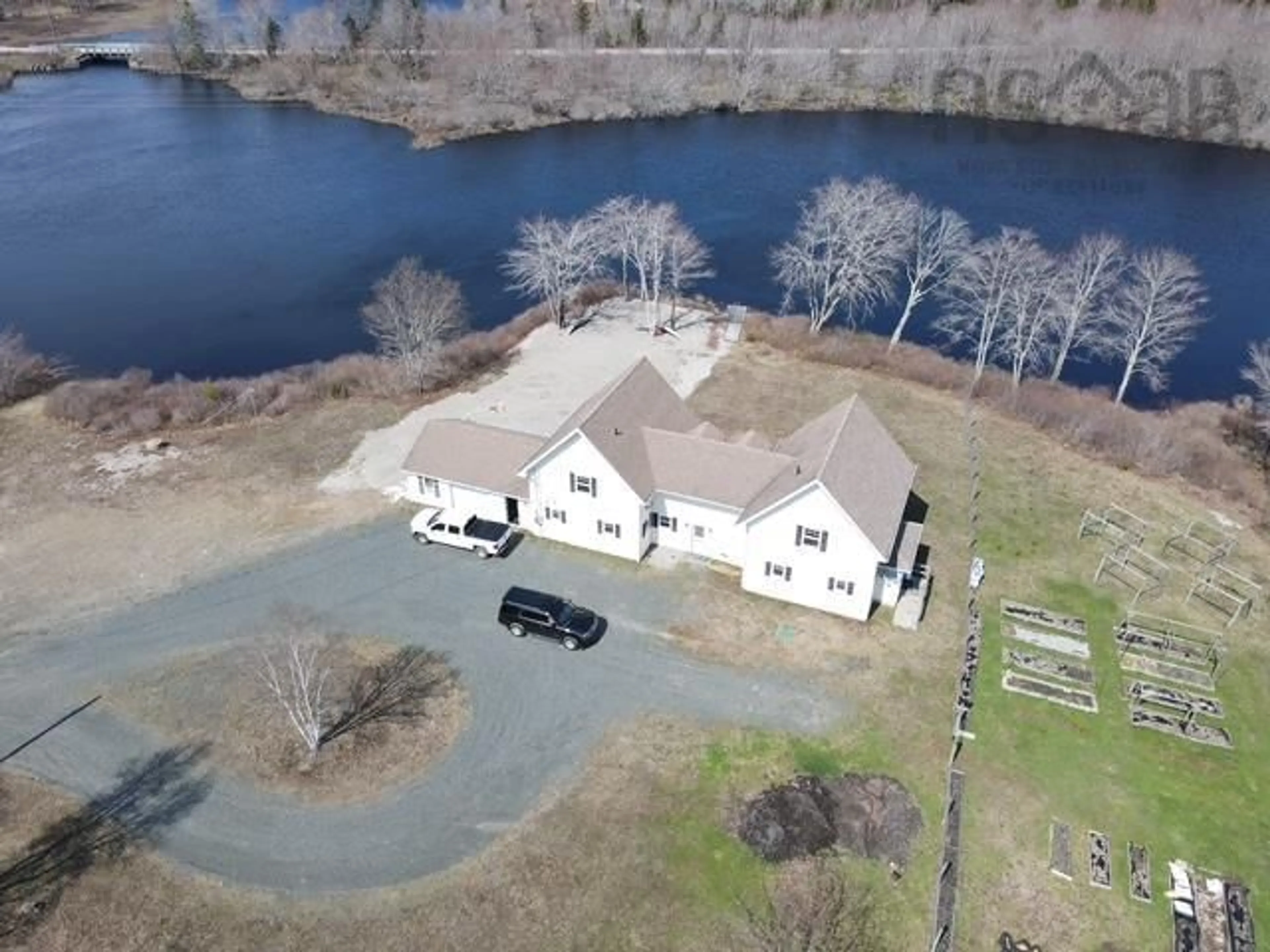A pic from outside/outdoor area/front of a property/back of a property/a pic from drone, water/lake/river/ocean view for 114-116 Scotts Dr, Summerville Nova Scotia B5A 5J5