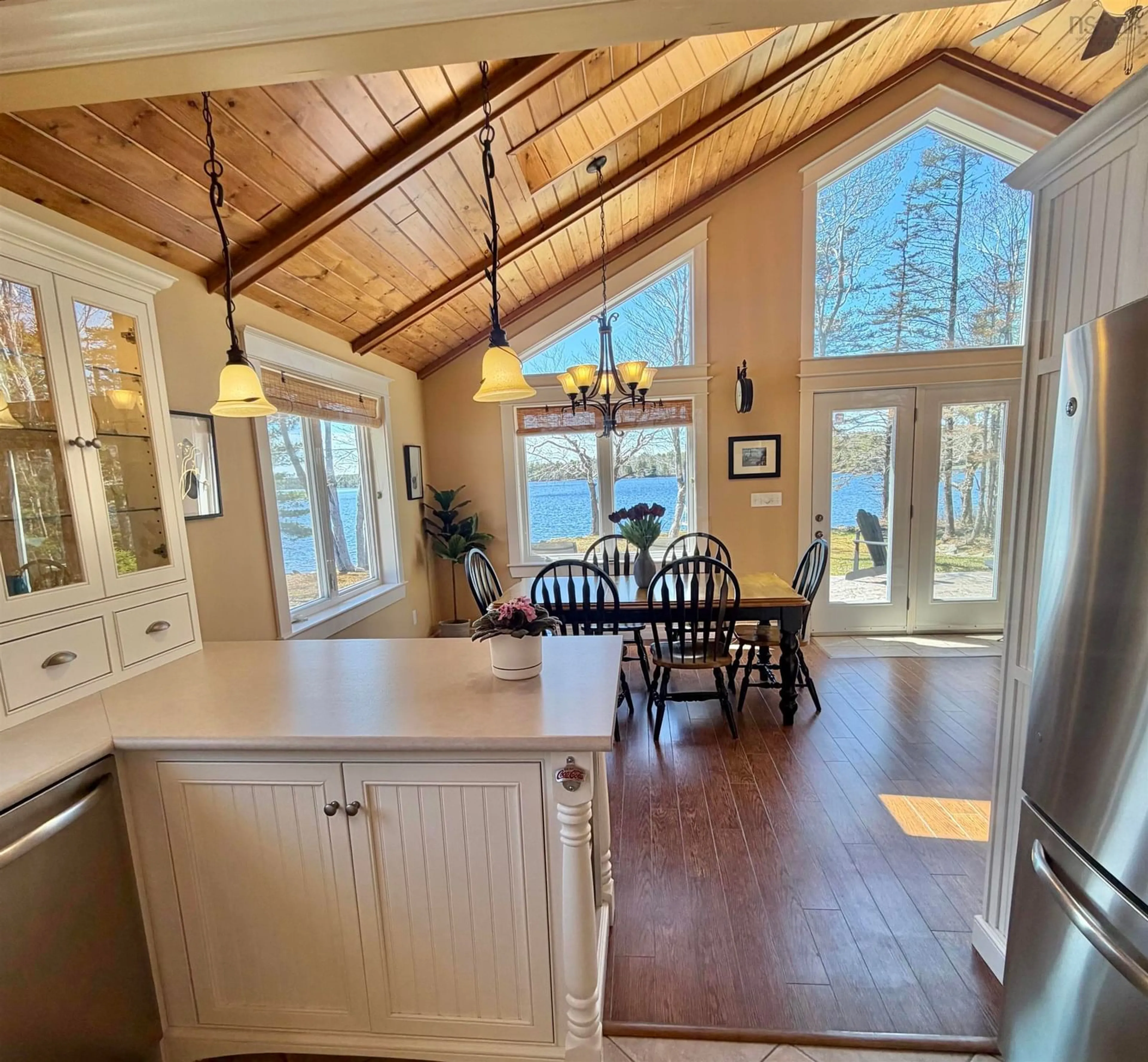 Open concept kitchen, wood/laminate floor for 50 Somes Lake Lane, Canaan Nova Scotia B0W 3M0