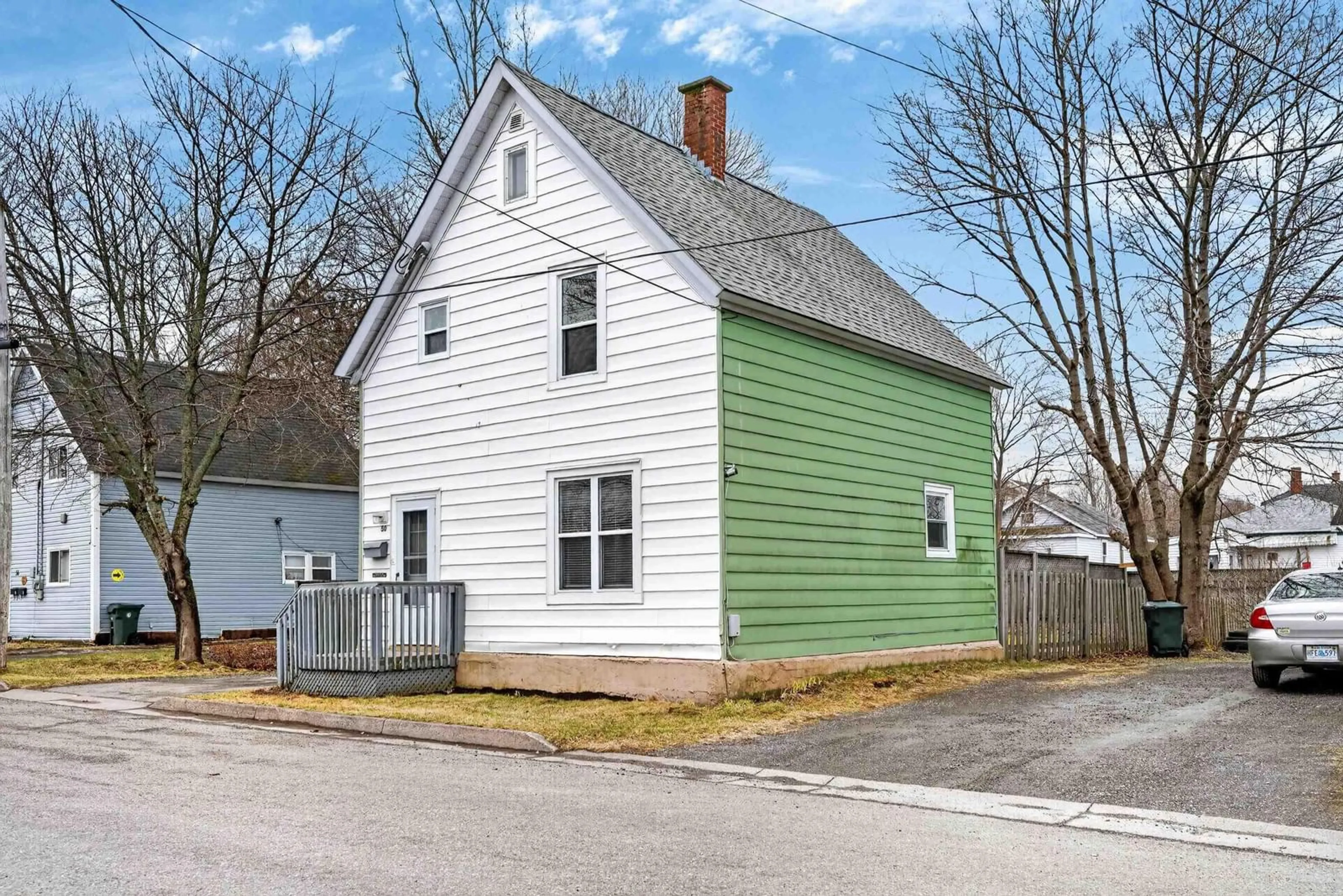 Home with vinyl exterior material, street for 50 Gritton Avenue, Sydney Nova Scotia B1S 2X9