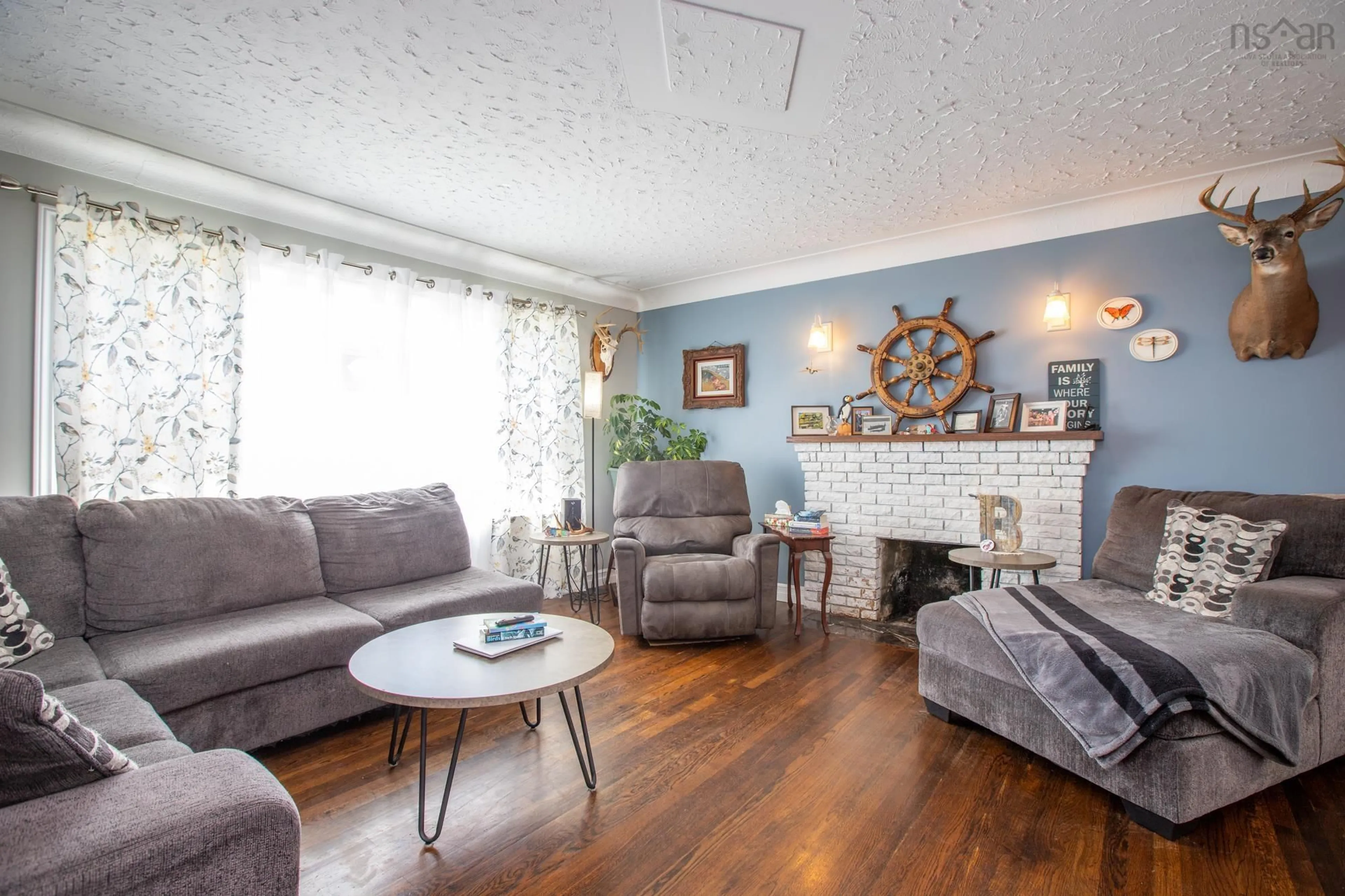Living room with furniture, wood/laminate floor for 22 Ellenvale Ave, Dartmouth Nova Scotia B2W 2W5
