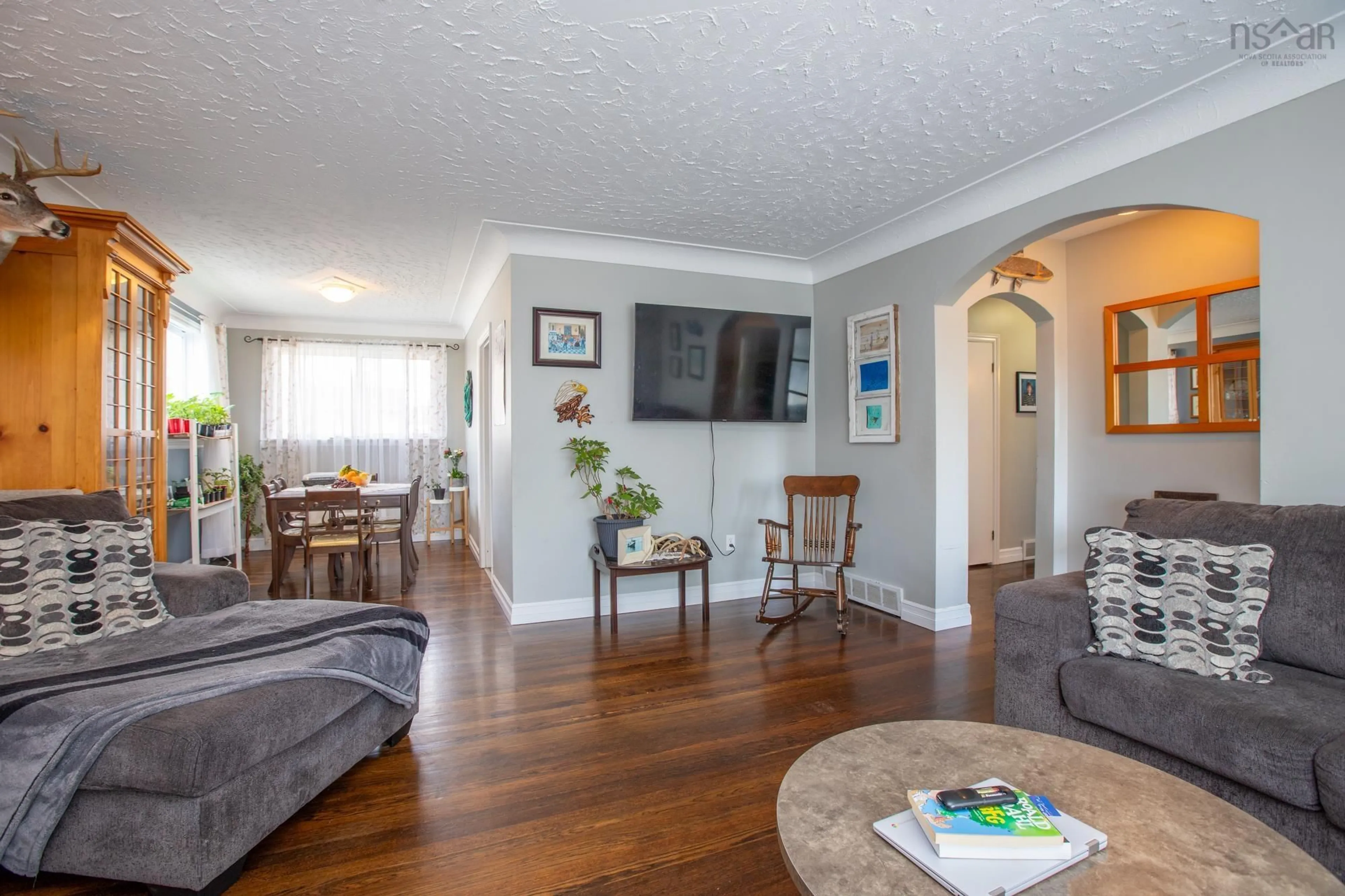 Living room with furniture, wood/laminate floor for 22 Ellenvale Ave, Dartmouth Nova Scotia B2W 2W5