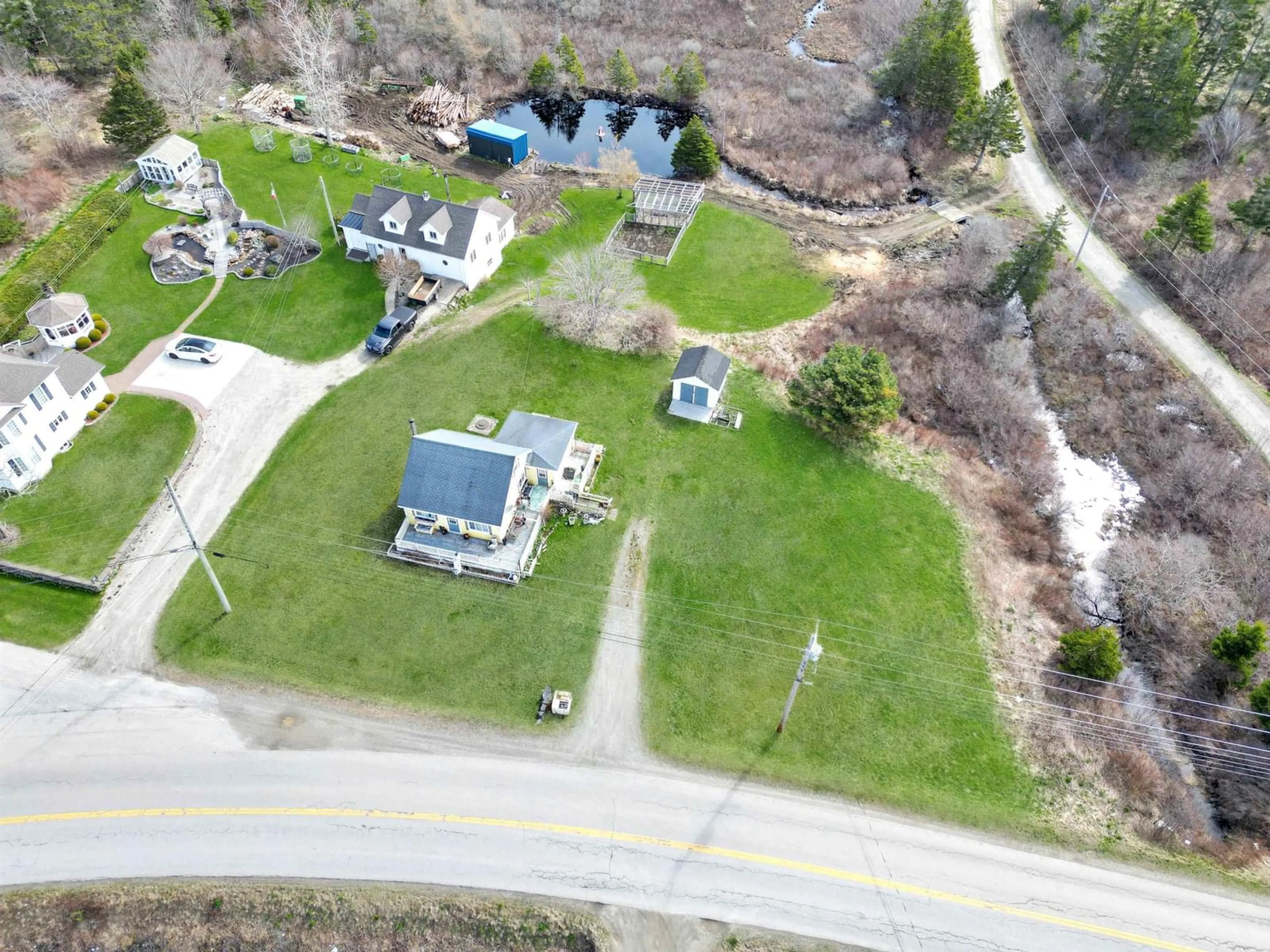 A pic from outside/outdoor area/front of a property/back of a property/a pic from drone, street for 289 Comeaus Hill Rd, Little River Harbour Nova Scotia B0W 1B0
