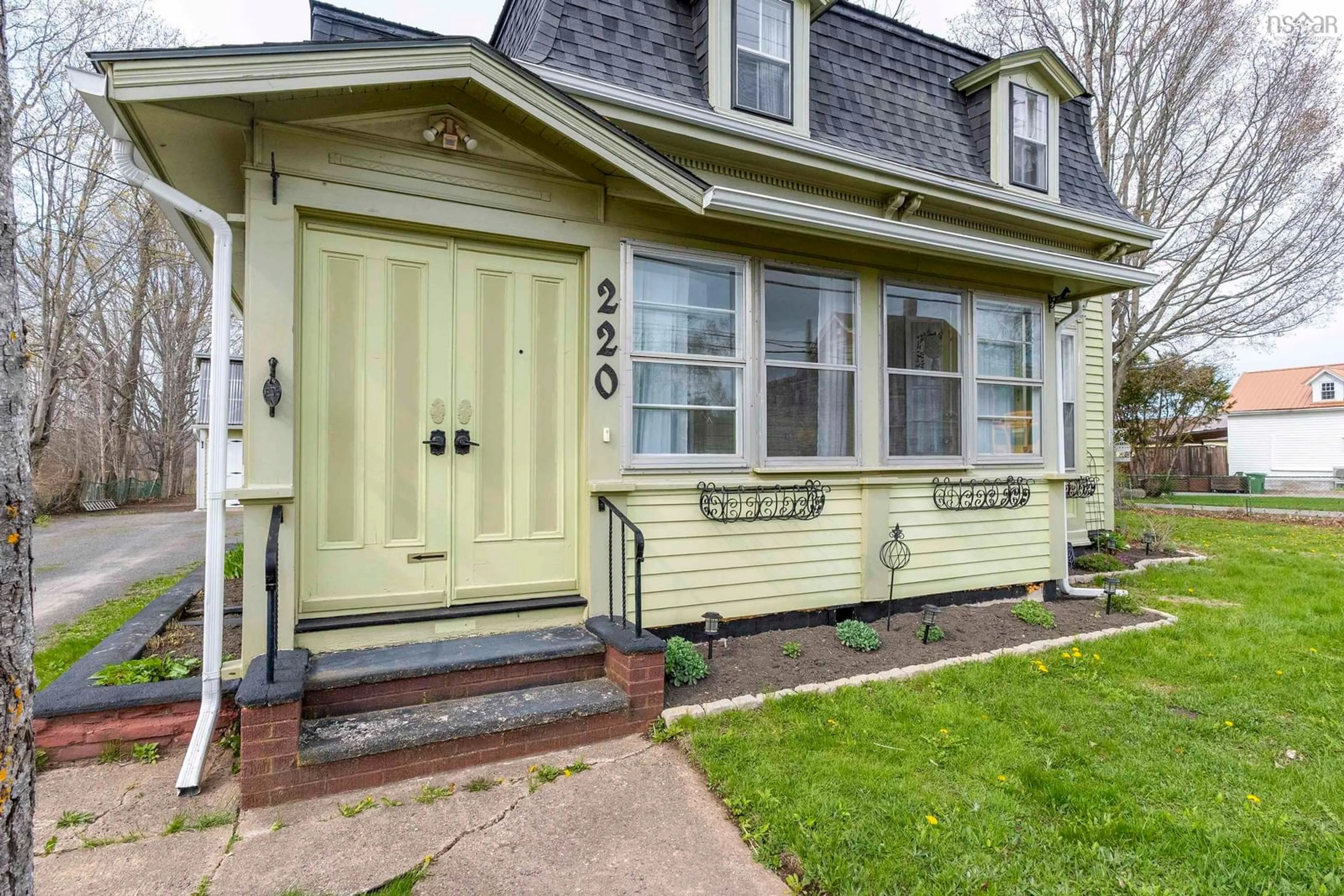 Home with vinyl exterior material, street for 220 Main St, Berwick Nova Scotia B0P 1E0