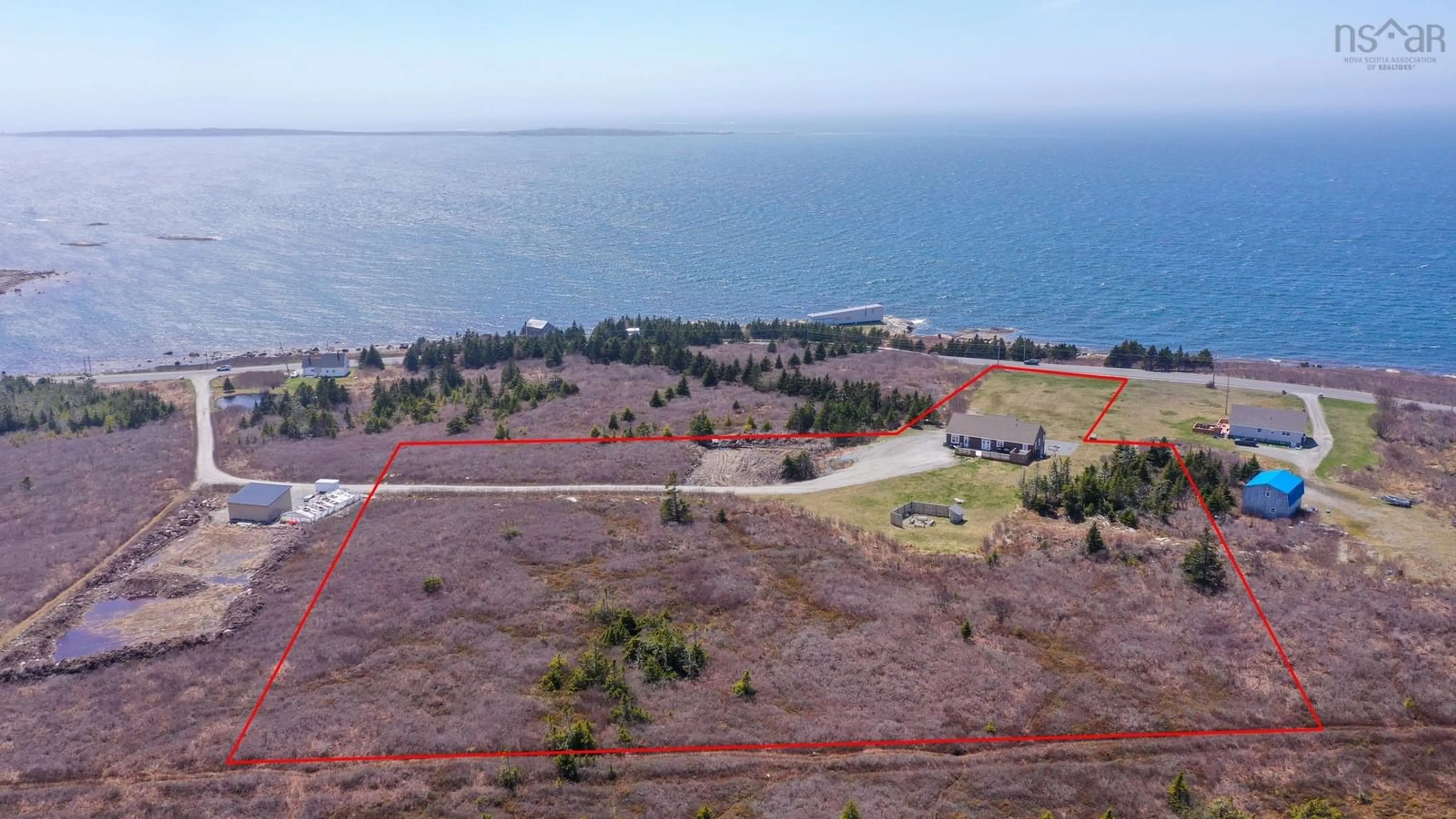 A pic from outside/outdoor area/front of a property/back of a property/a pic from drone, water/lake/river/ocean view for 5990 Hwy 3, Shag Harbour Nova Scotia B0W 3B0