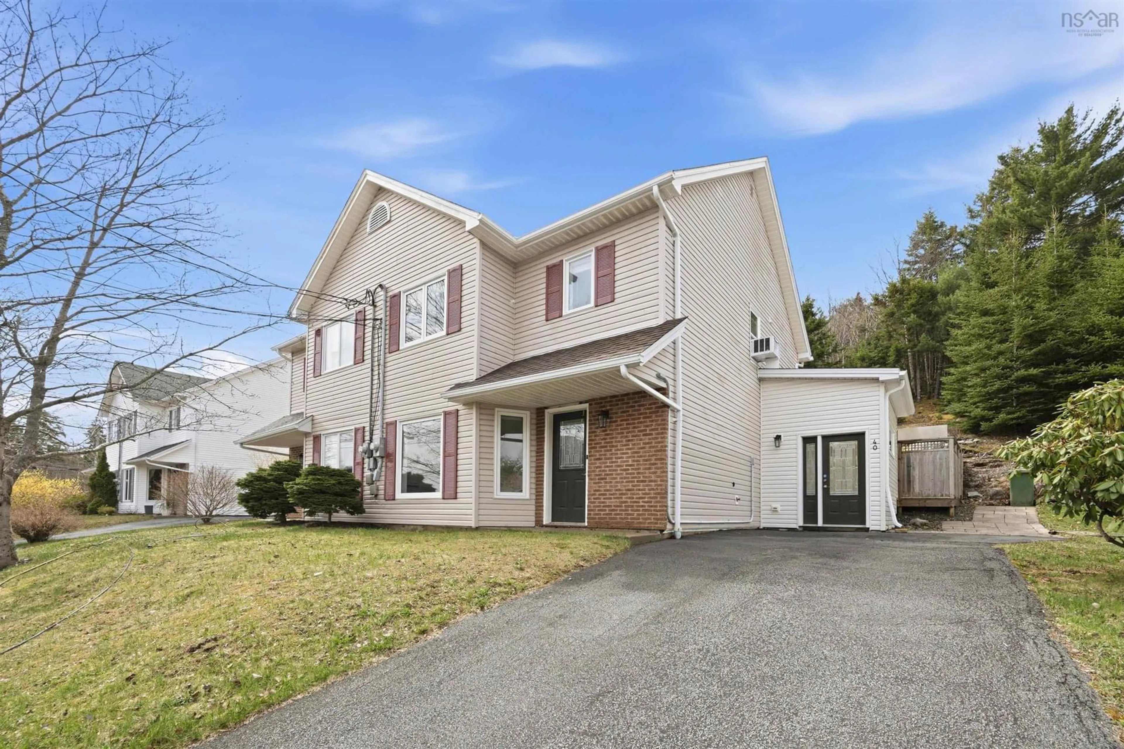 Home with vinyl exterior material, street for 40 Amin St, Bedford Nova Scotia B4A 4B8