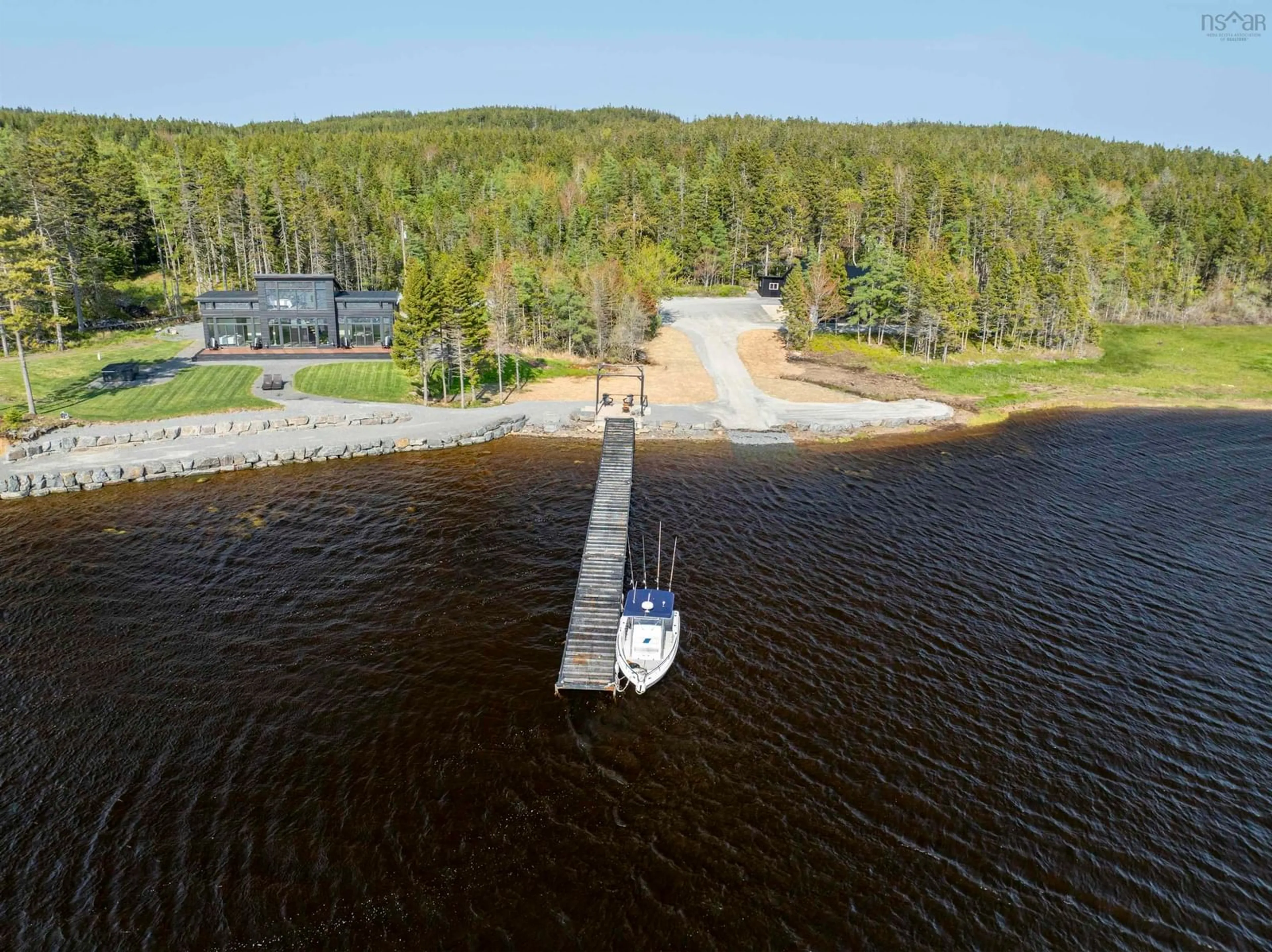 A pic from outside/outdoor area/front of a property/back of a property/a pic from drone, water/lake/river/ocean view for 4125 332 Hwy, East Lahave Nova Scotia B4V 0W1